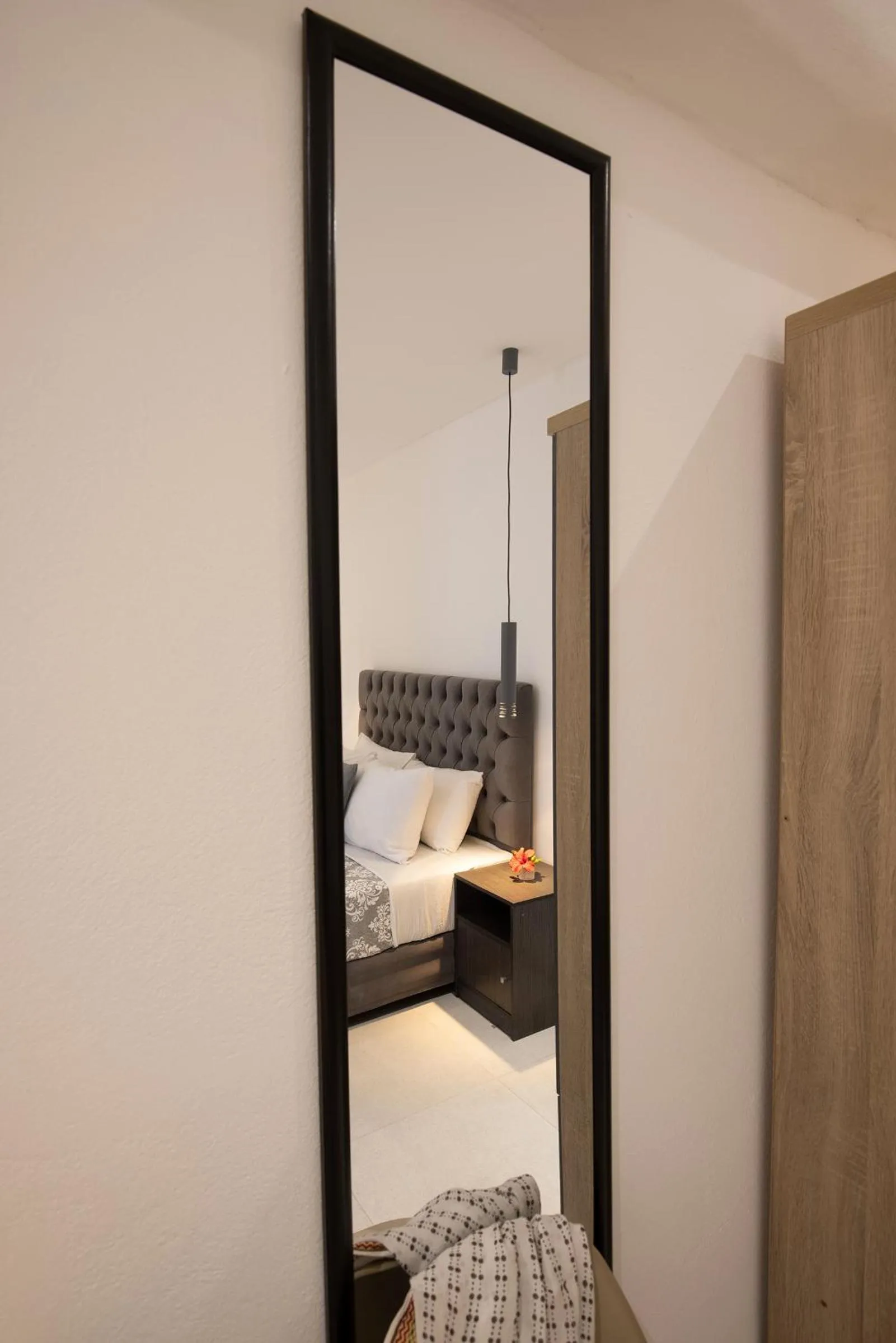 Bed in Chrysonisos Suites with Sunset & Seaviews near Kini