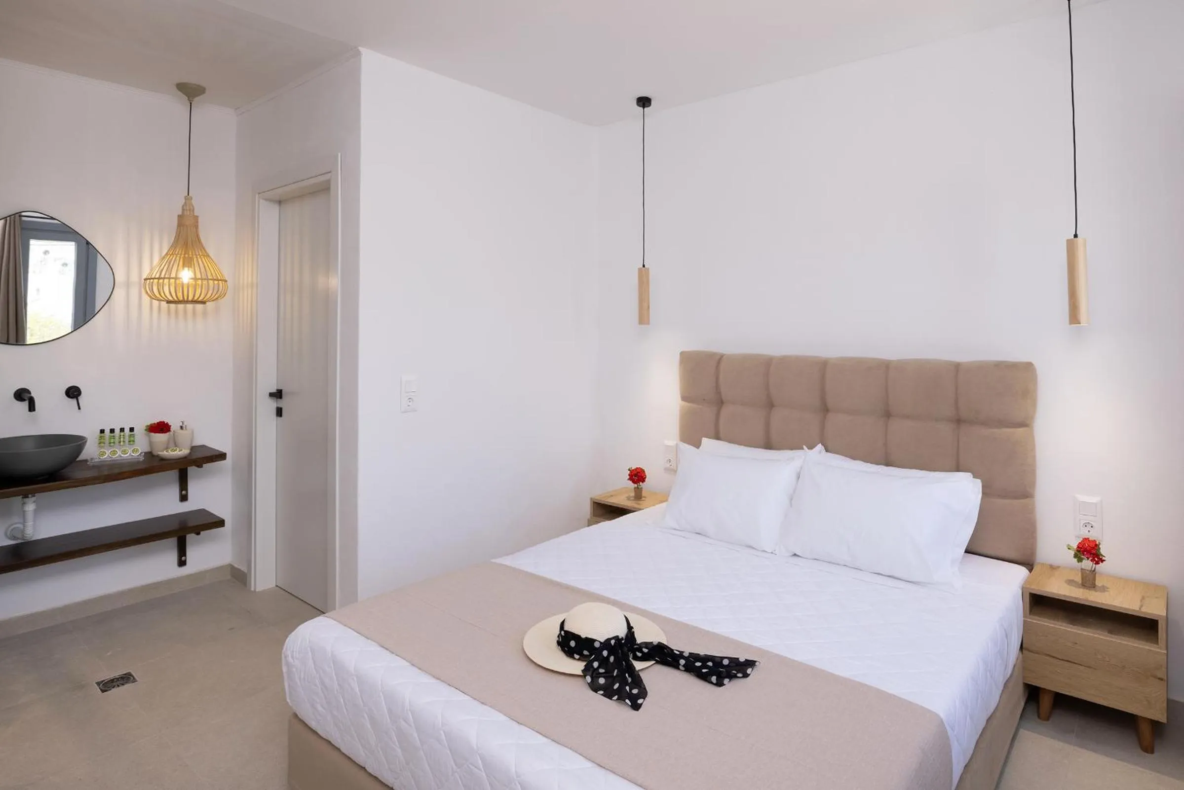 Bedroom, Bed in Chrysonisos Suites with Sunset & Seaviews near Kini