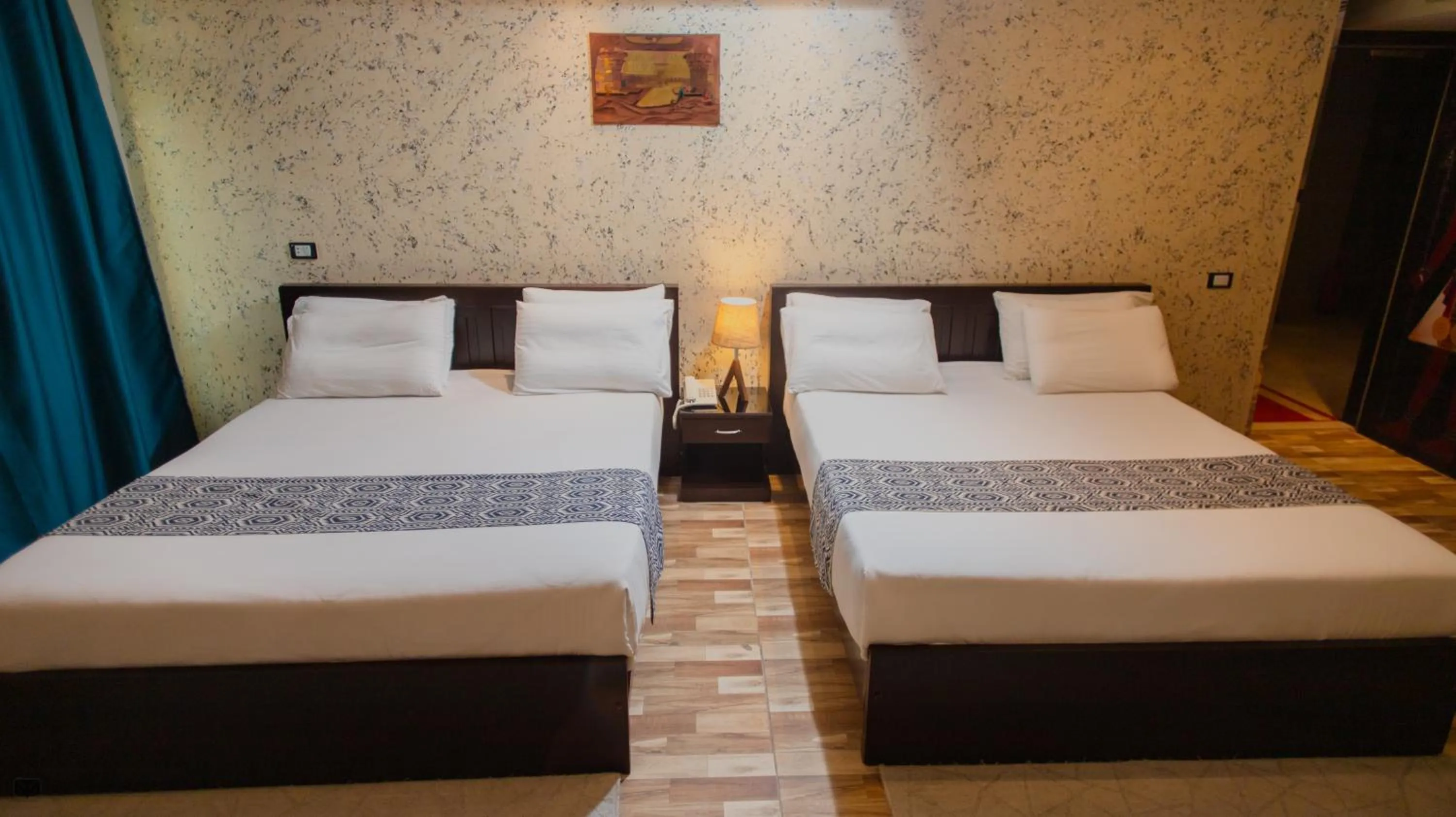 Bed in Turquoise Pyramids & Grand Egyptian museum view Hotel