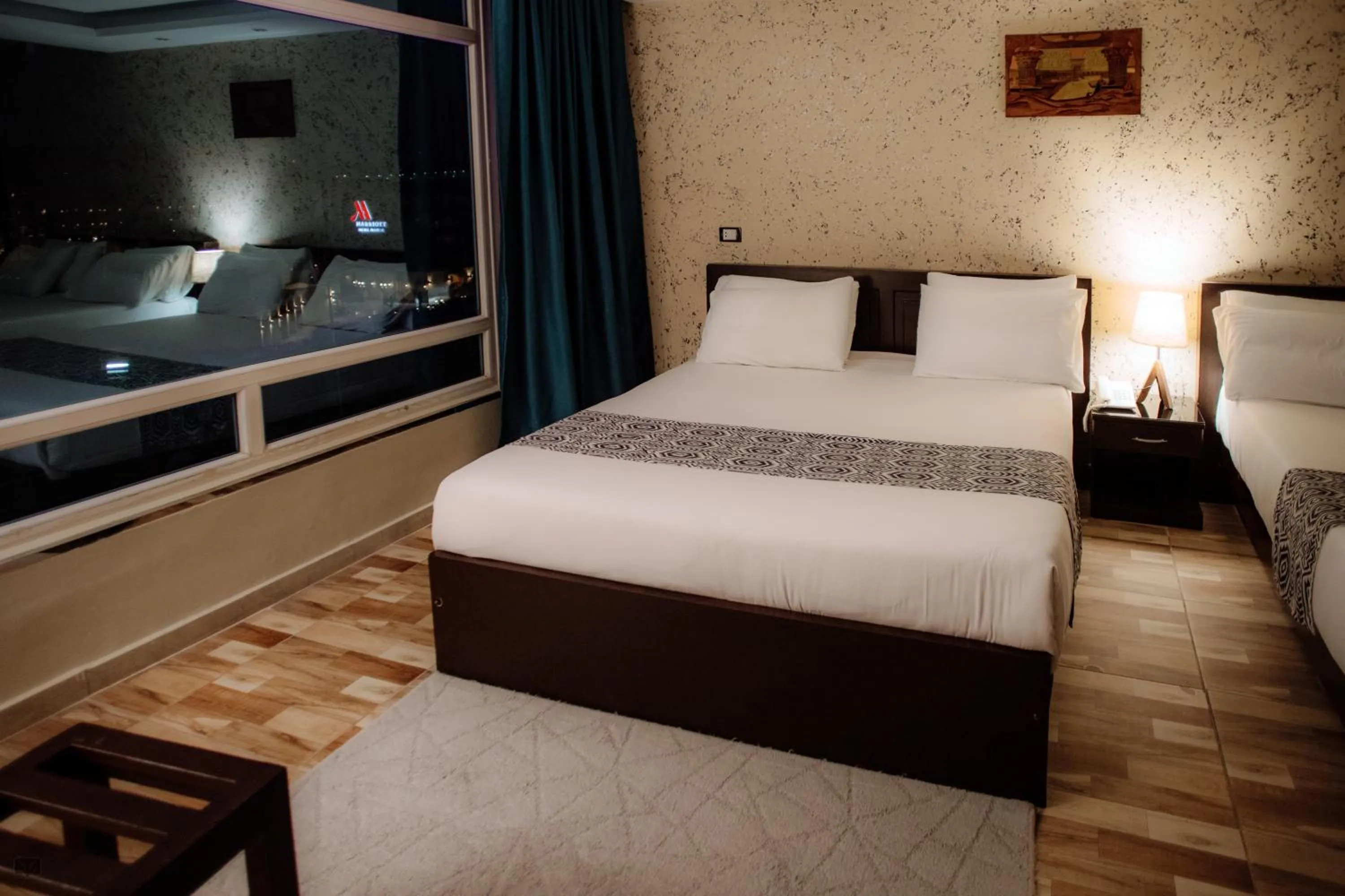 Bed in Turquoise Pyramids & Grand Egyptian museum view Hotel