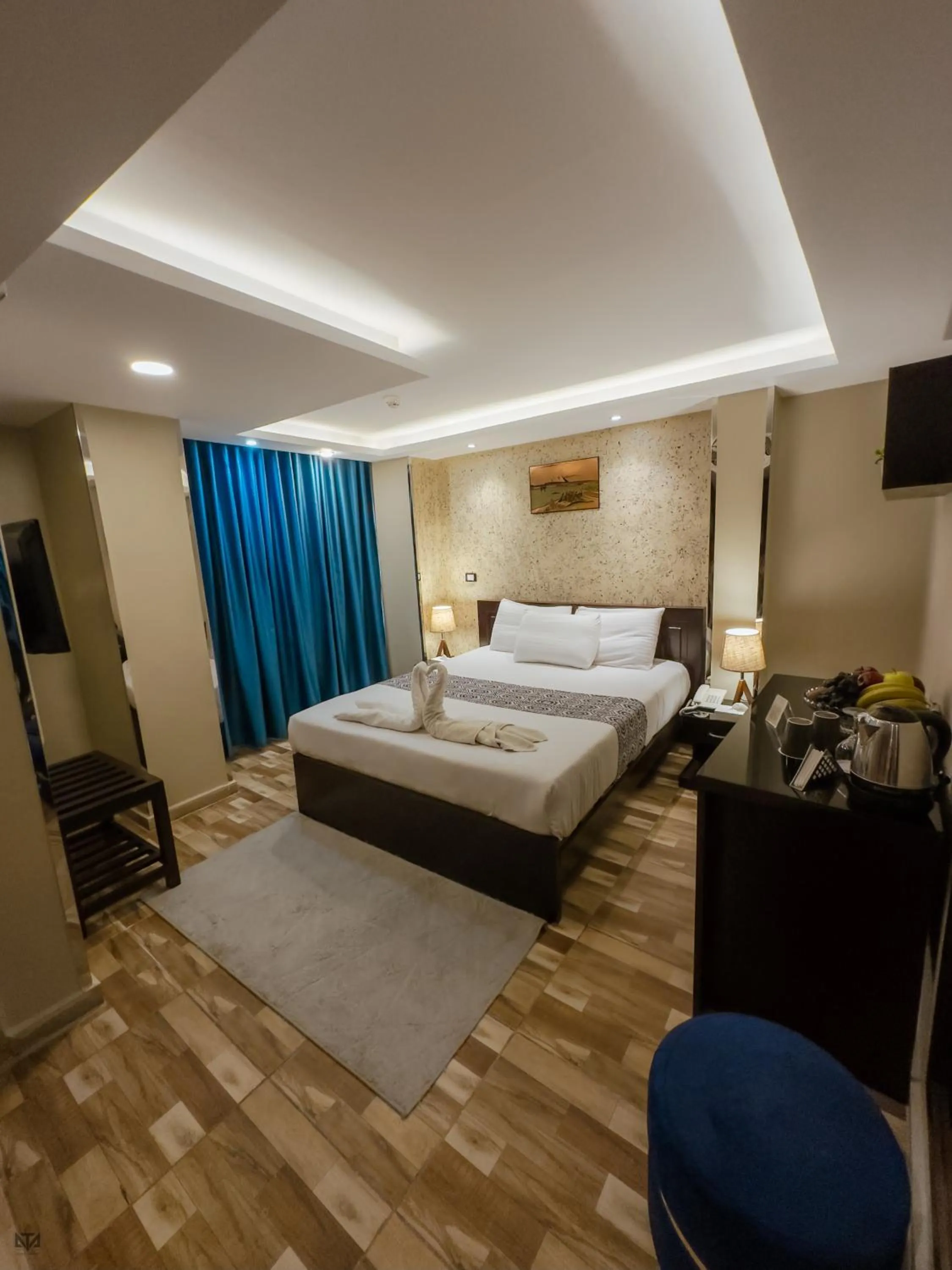 Bed in Turquoise Pyramids & Grand Egyptian museum view Hotel