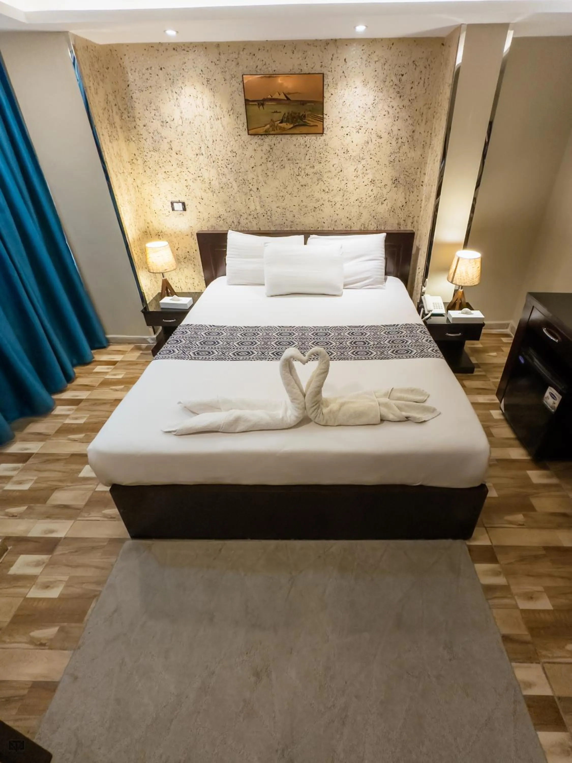 Bed in Turquoise Pyramids & Grand Egyptian museum view Hotel