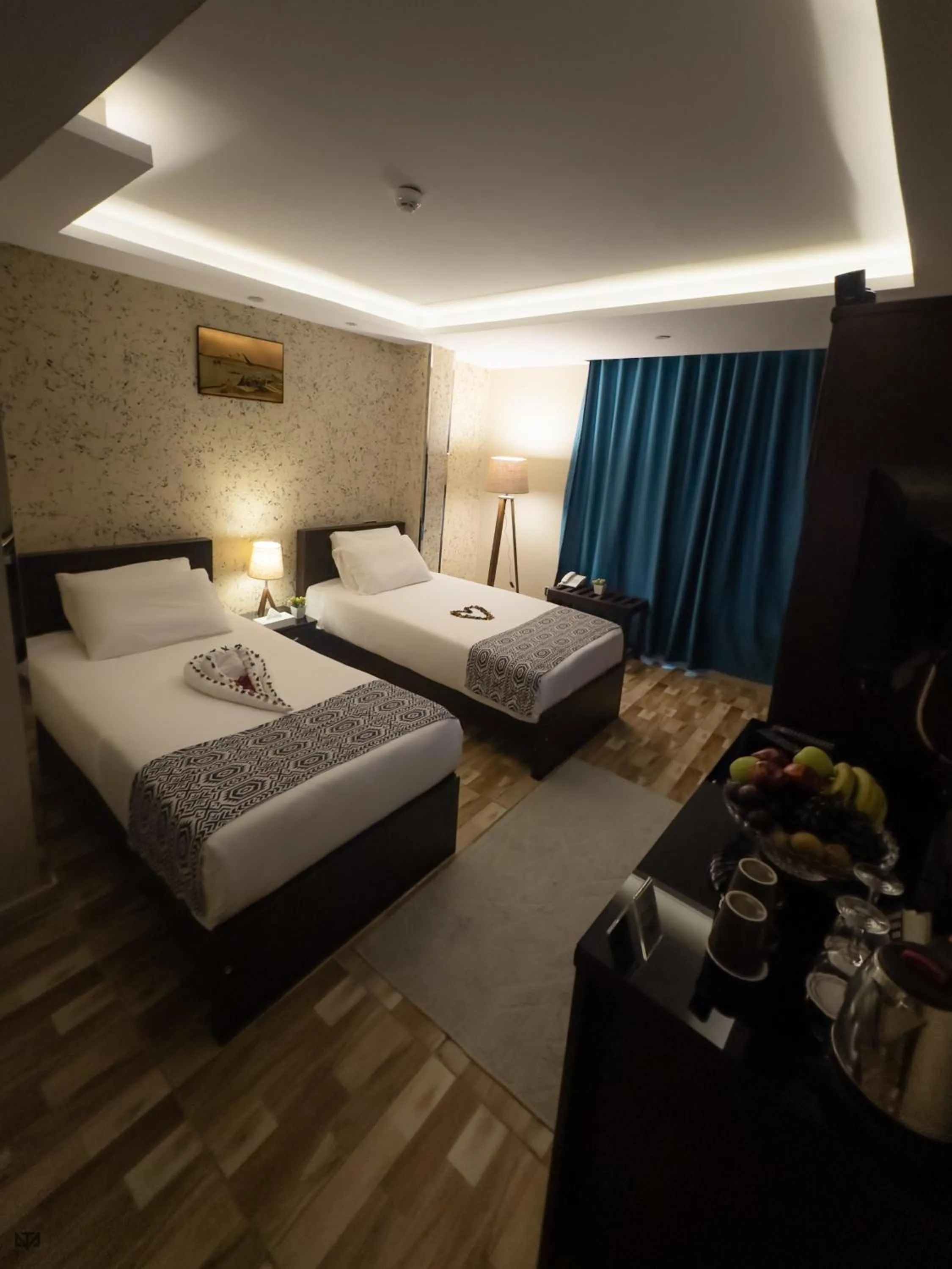 Bed in Turquoise Pyramids & Grand Egyptian museum view Hotel