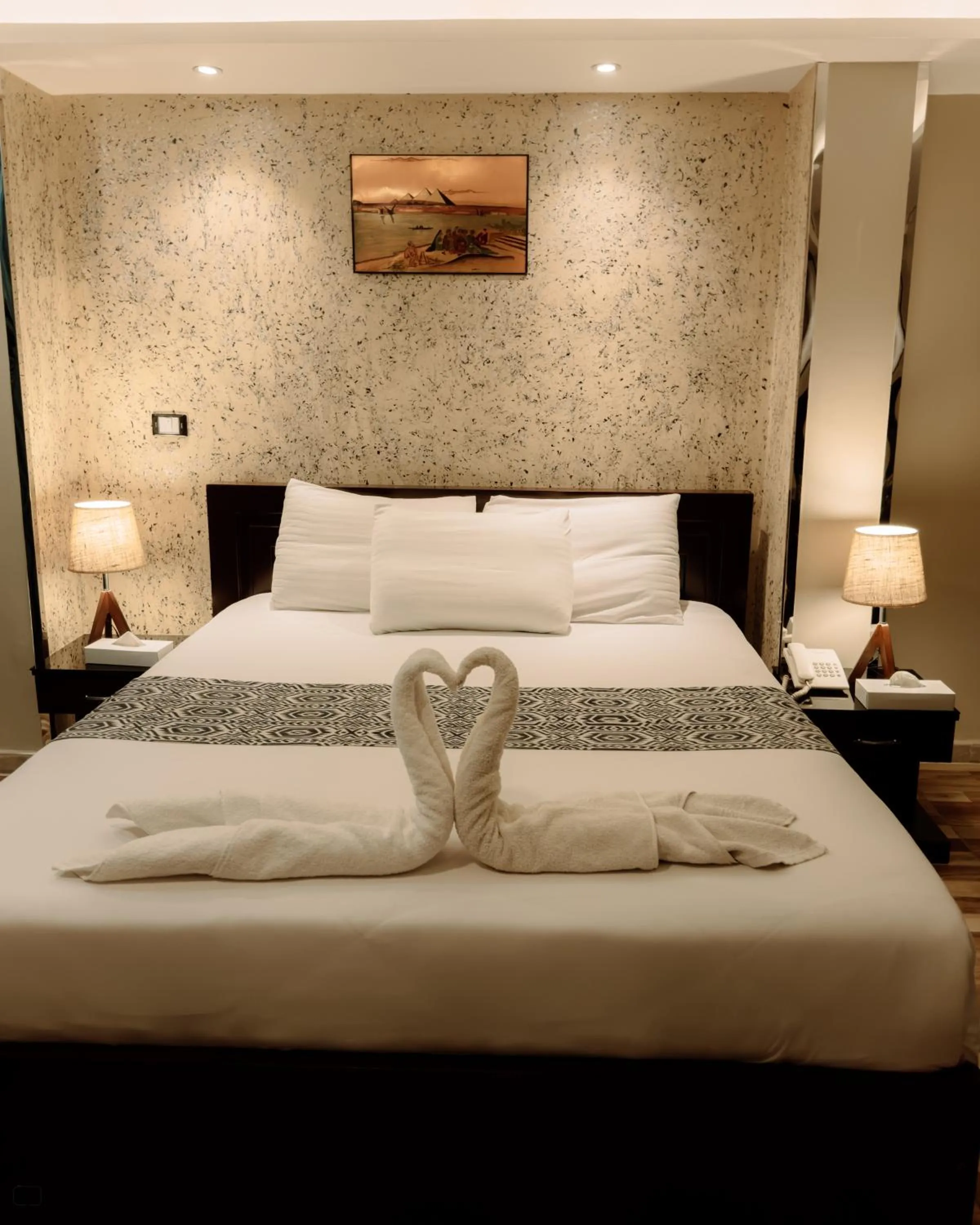 Bed in Turquoise Pyramids & Grand Egyptian museum view Hotel