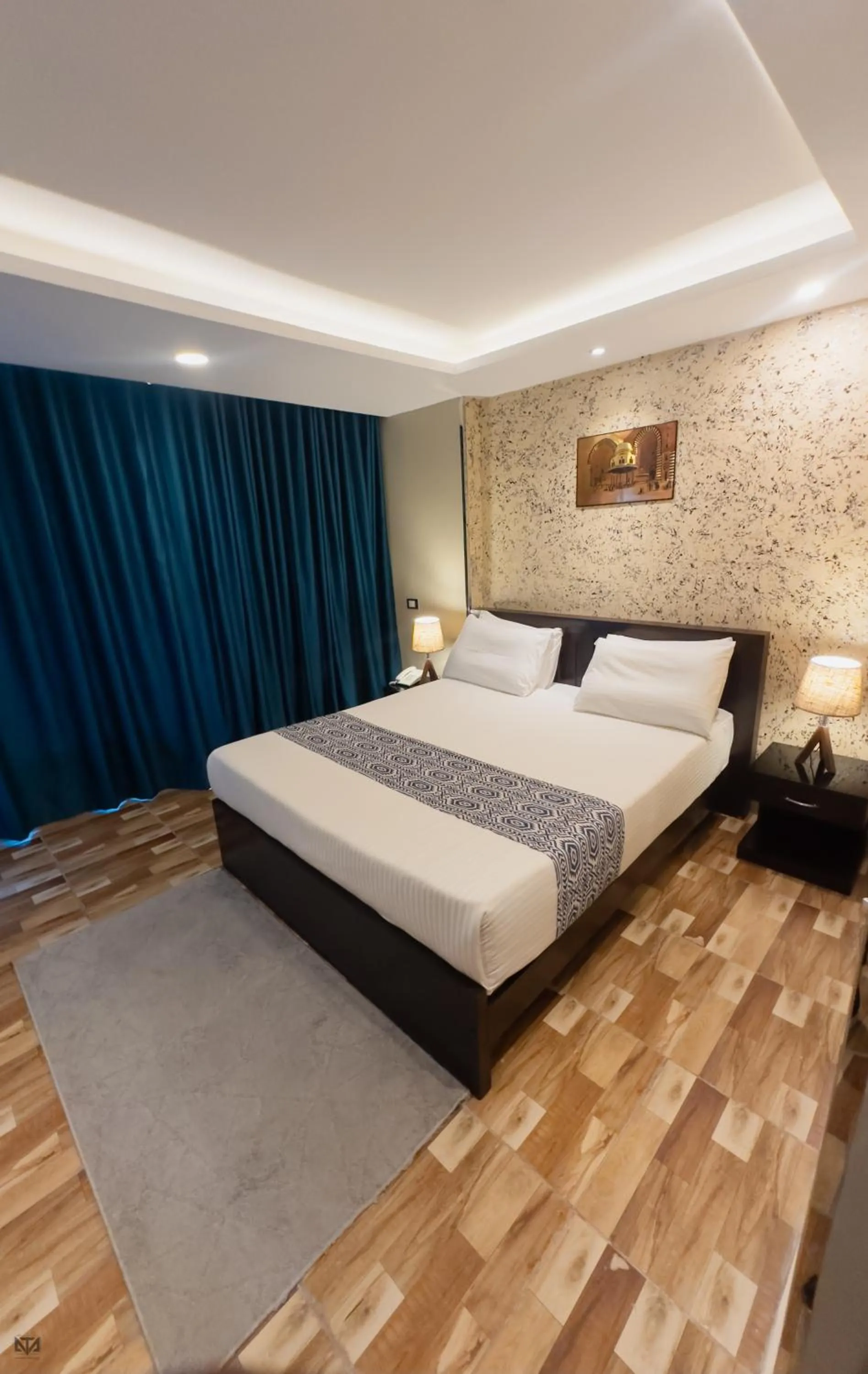 Bed in Turquoise Pyramids & Grand Egyptian museum view Hotel