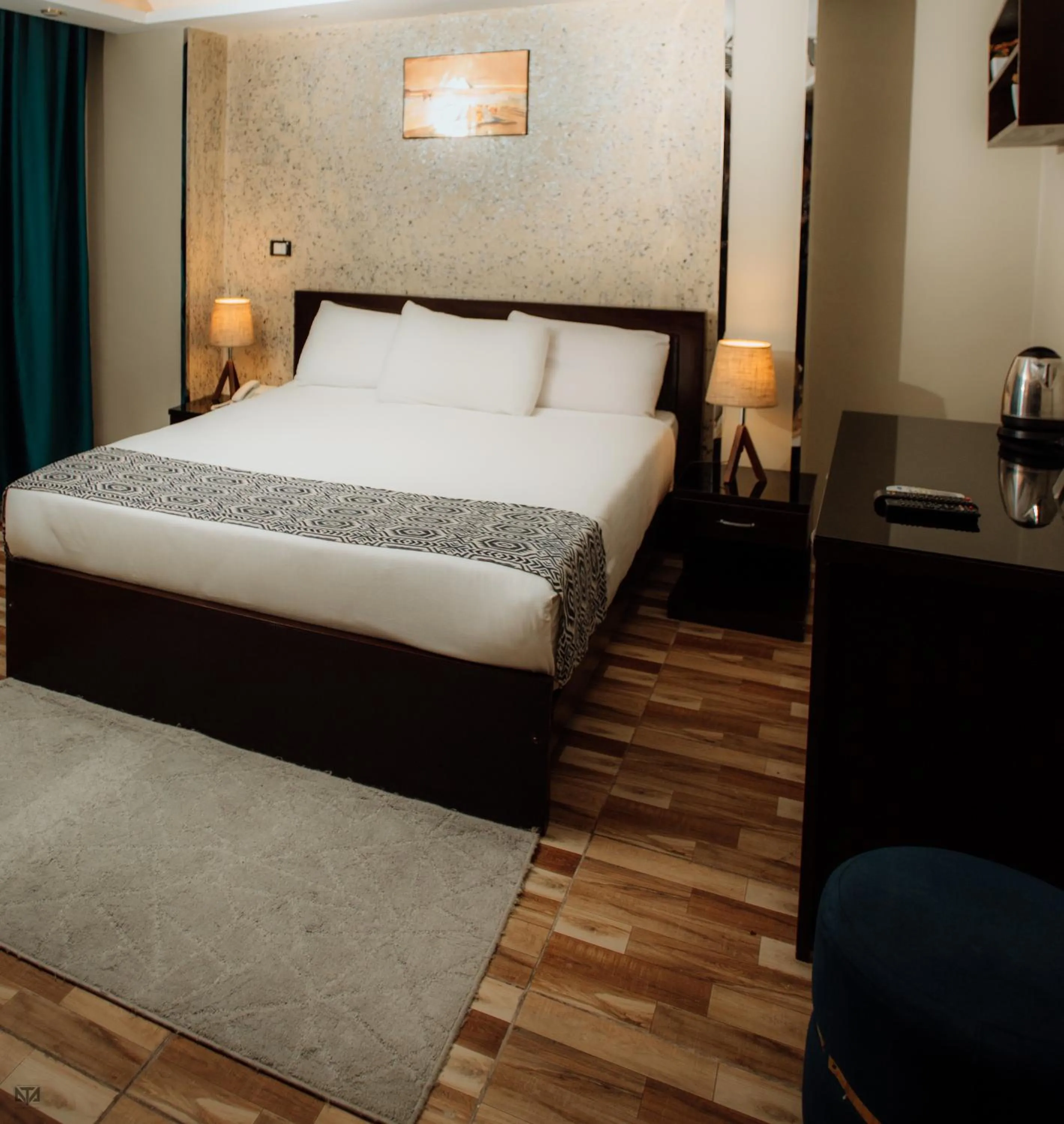 Bed in Turquoise Pyramids & Grand Egyptian museum view Hotel