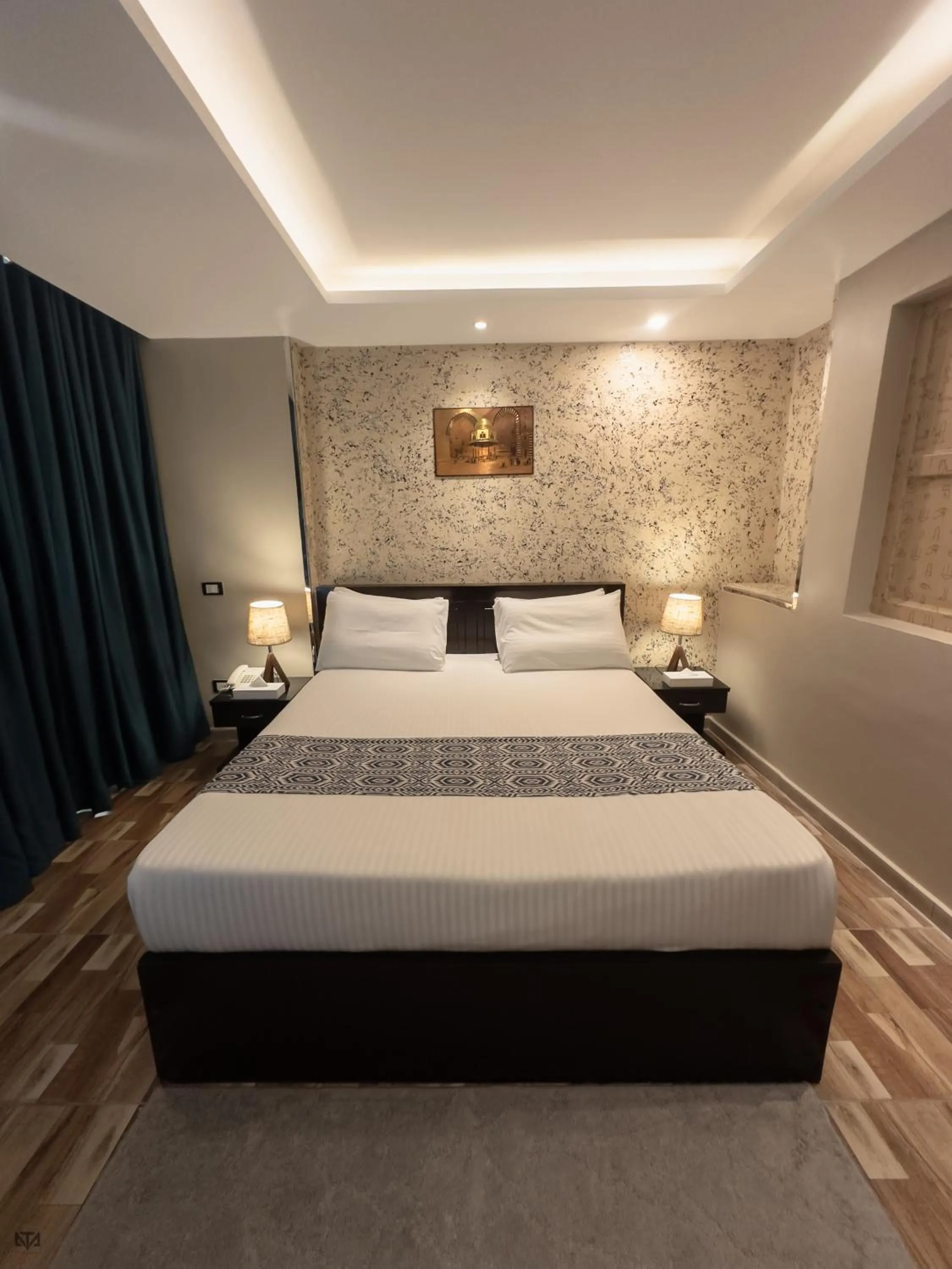 Bed in Turquoise Pyramids & Grand Egyptian museum view Hotel