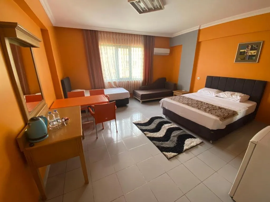 Seating area, Bed in City House Hotel