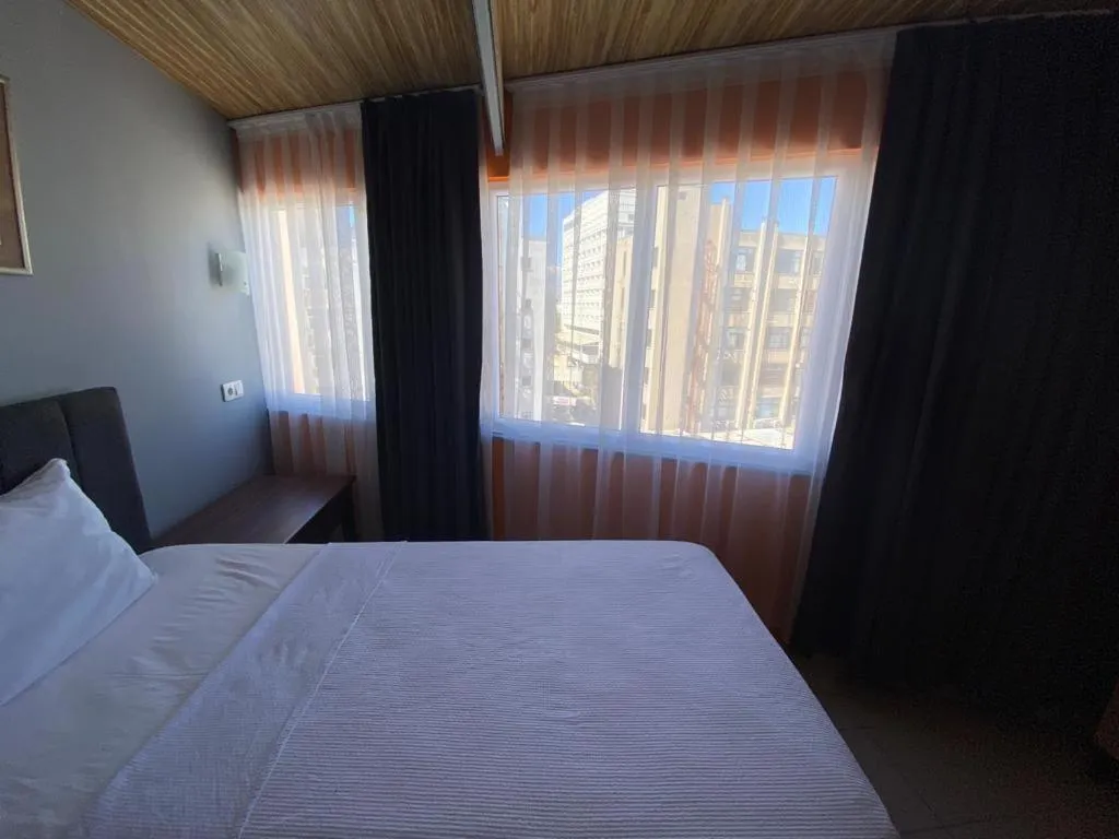 Photo of the whole room, Bed in City House Hotel