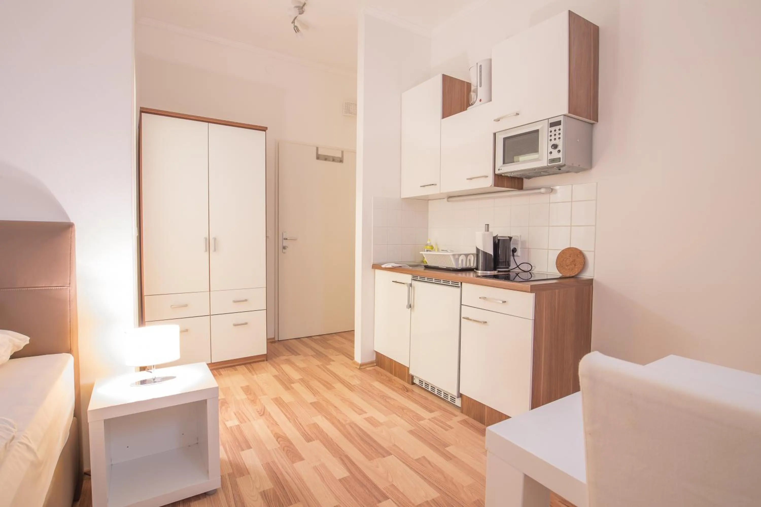 Kitchen or kitchenette in Grand Central Station Apartments I contactless check-in