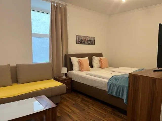 Bed in Grand Central Station Apartments I contactless check-in