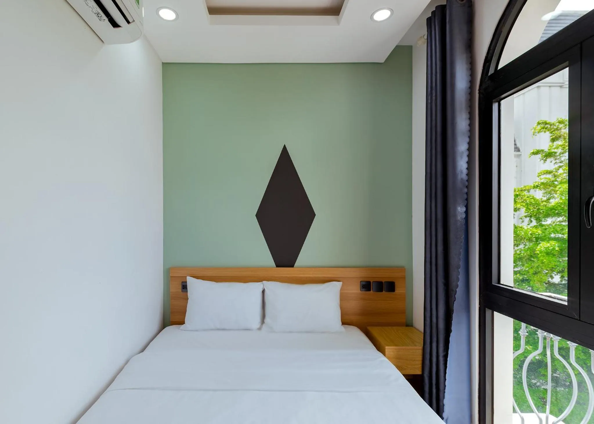Bed in Lalisa Hotel Grand World Phu Quoc