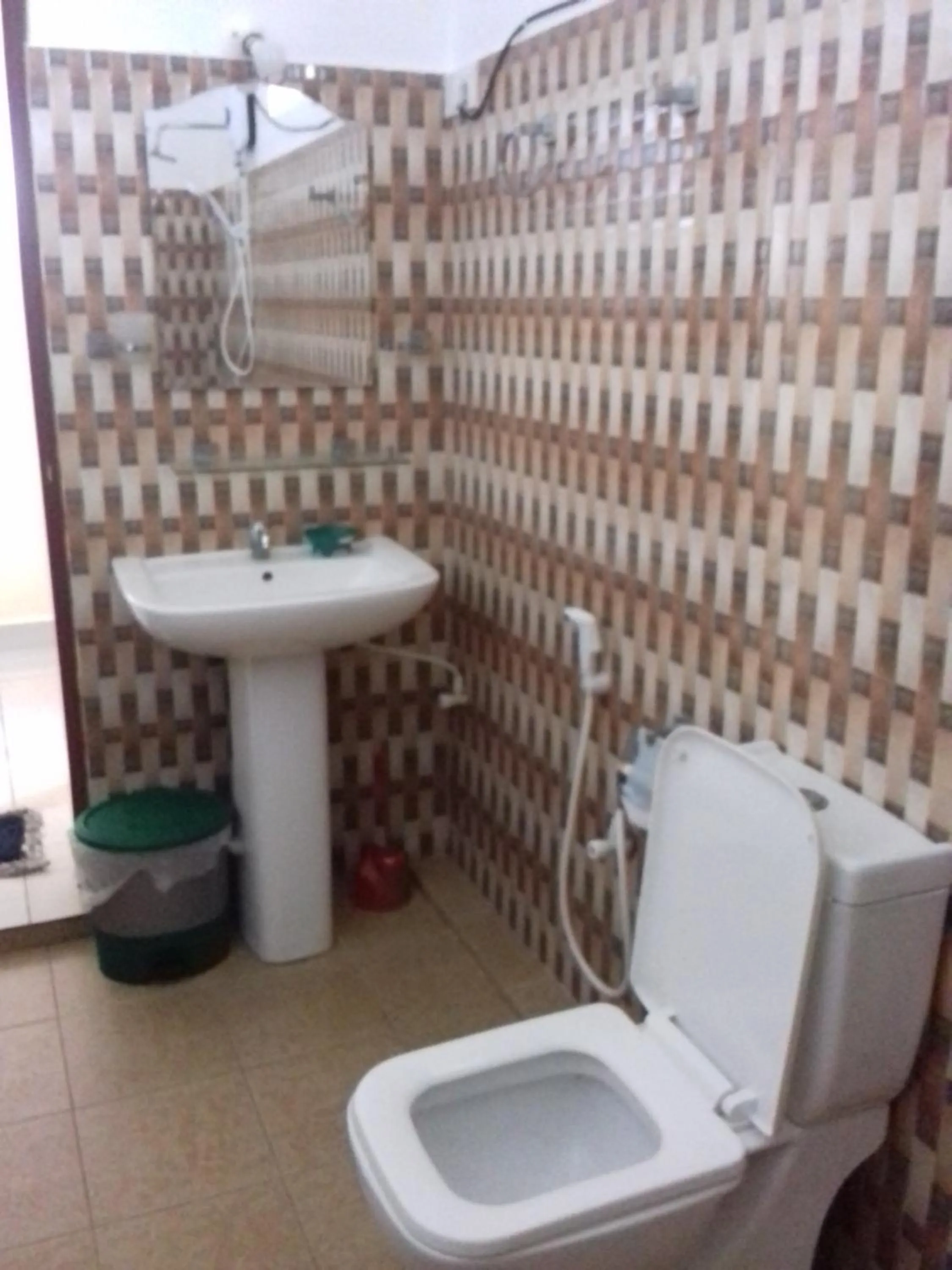 Bathroom in New Golden Bay Resort Weligama