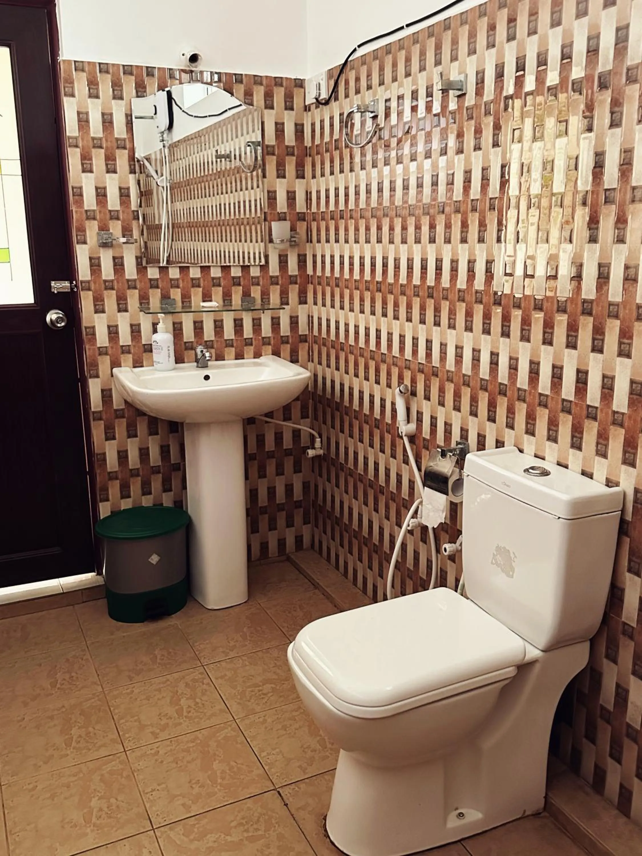 Toilet in New Golden Bay Resort Weligama