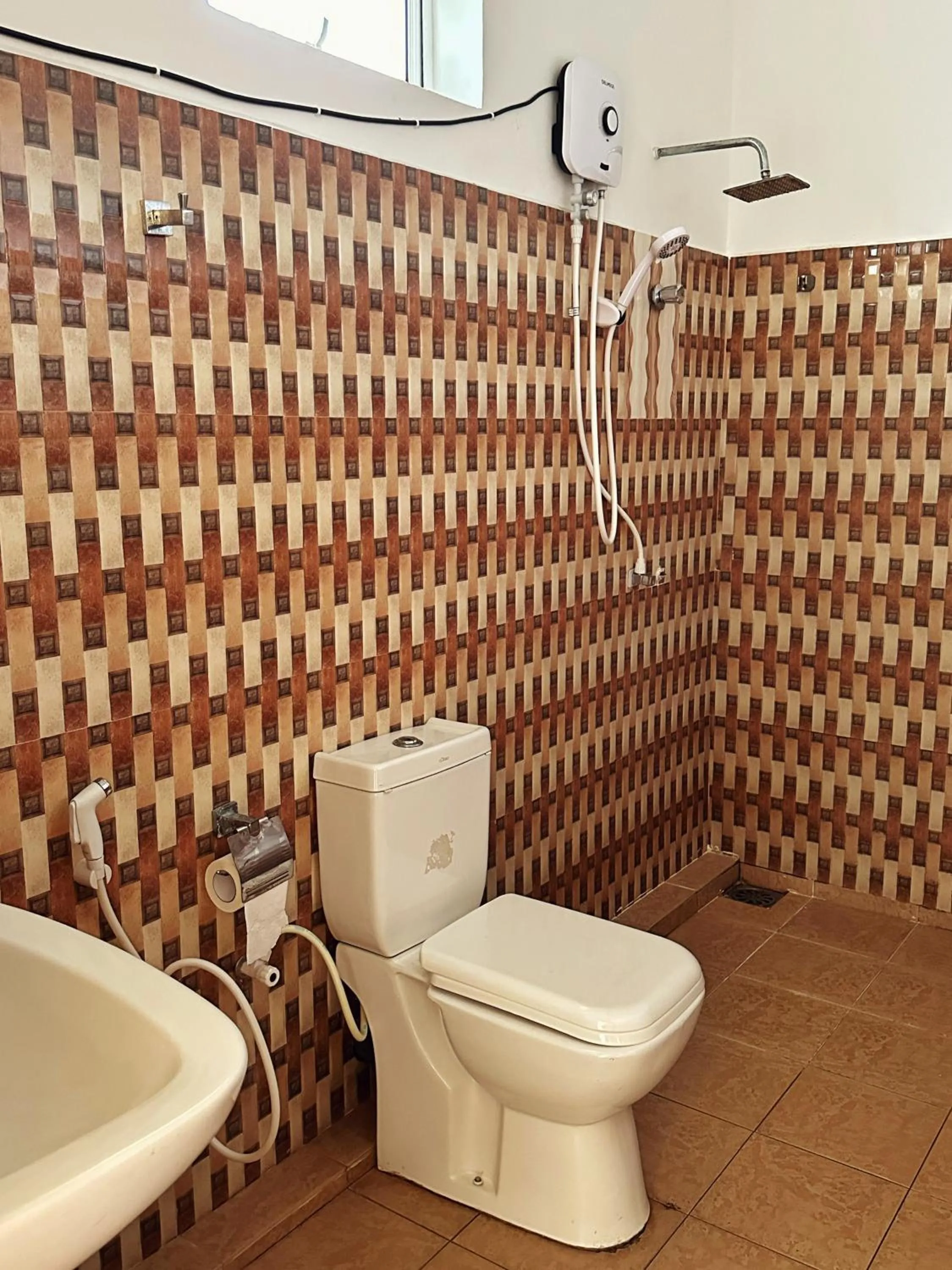 Bathroom in New Golden Bay Resort Weligama