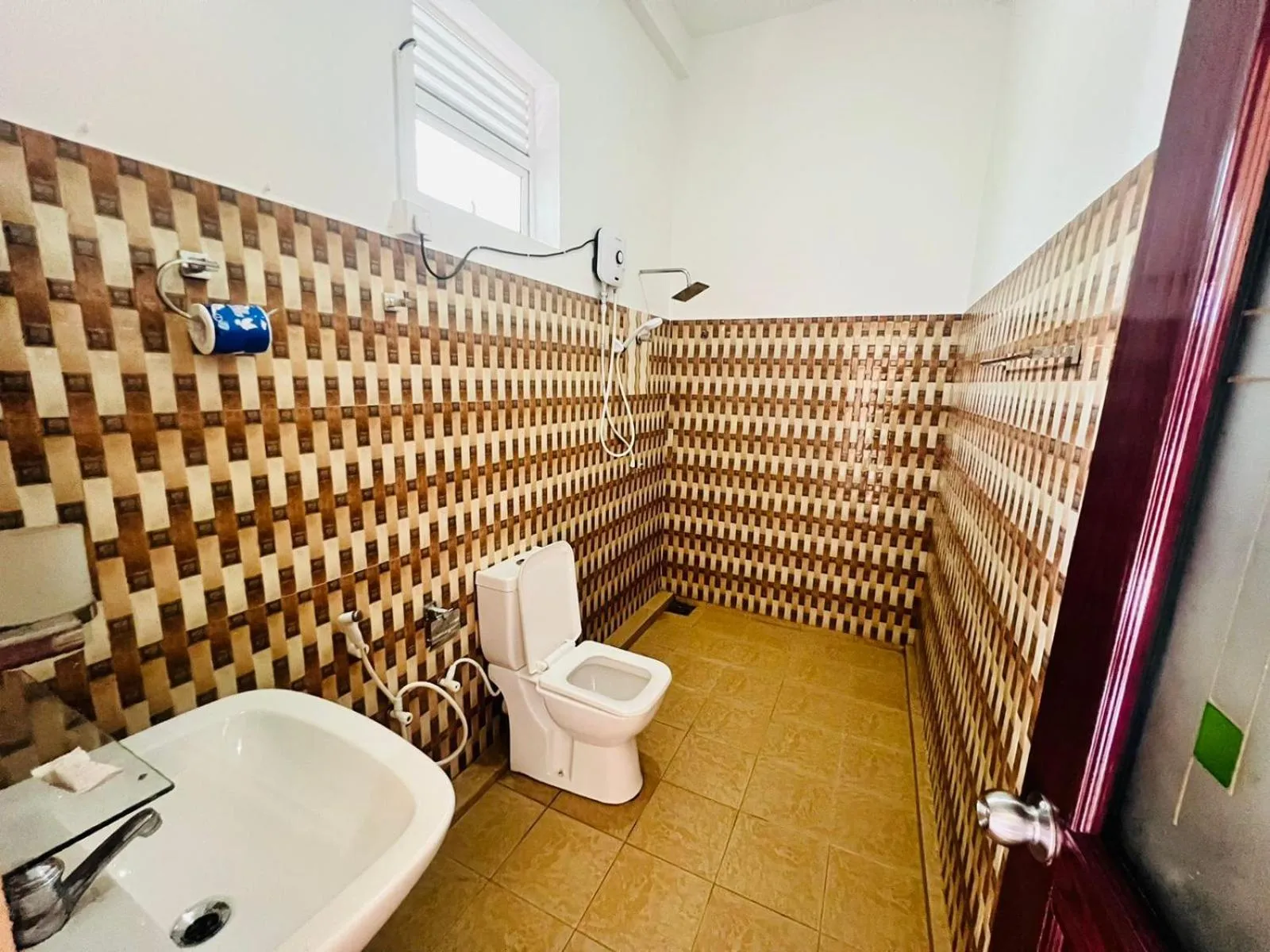 Bathroom in New Golden Bay Resort Weligama