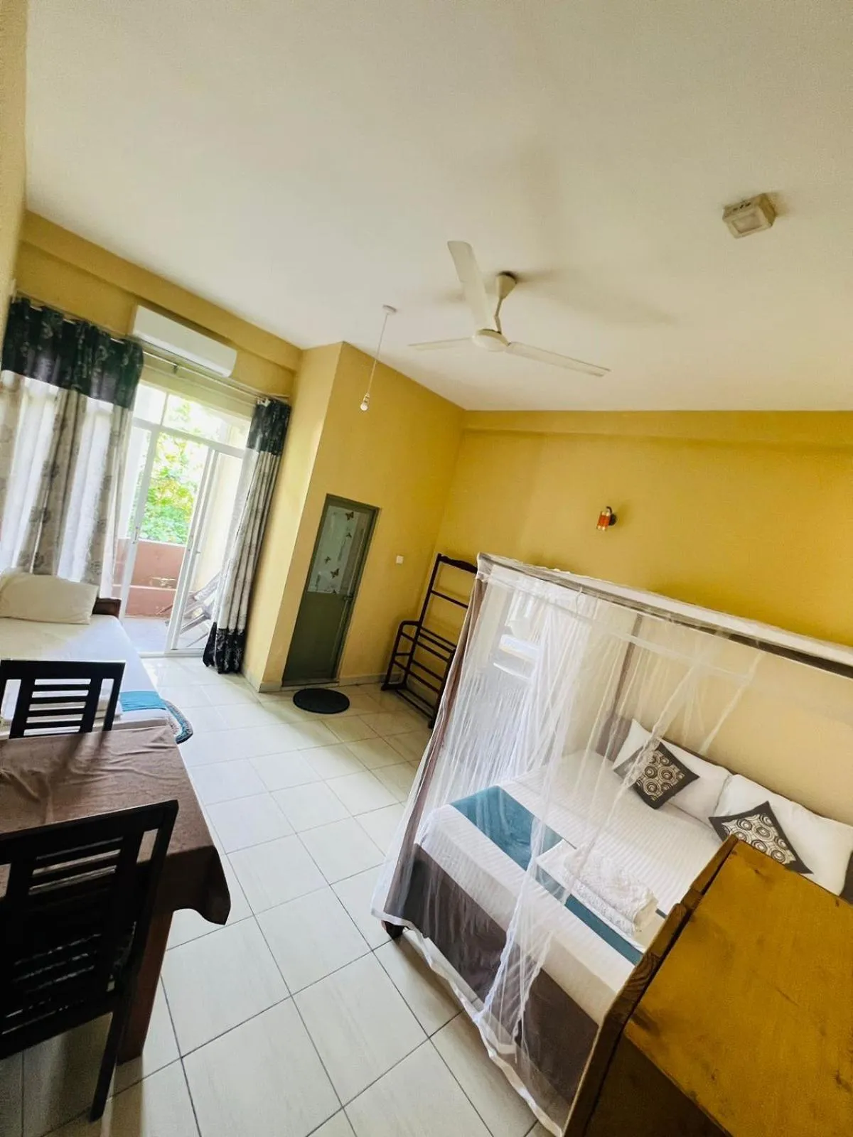 Photo of the whole room, Bed in New Golden Bay Resort Weligama