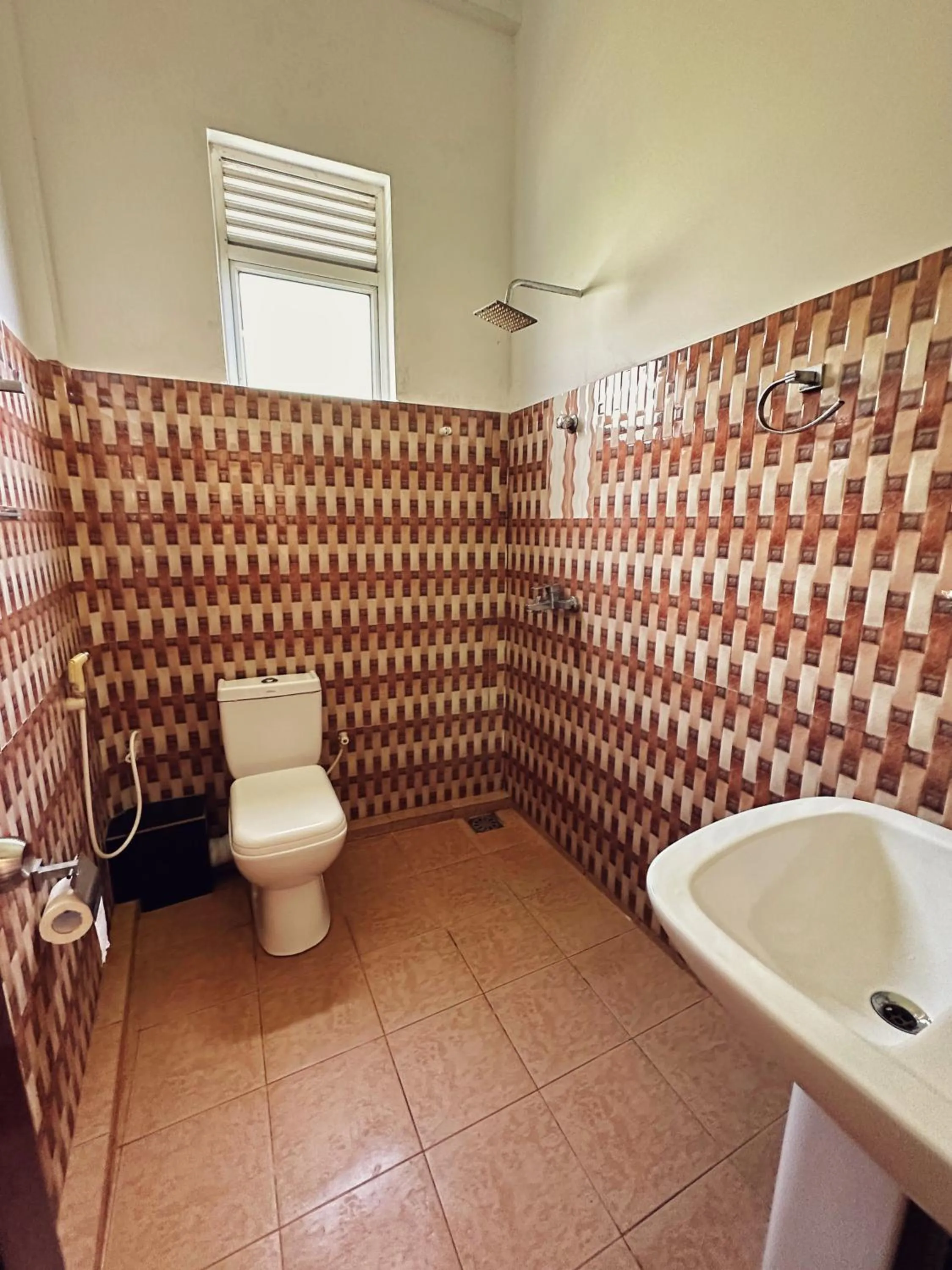 Bathroom in New Golden Bay Resort Weligama