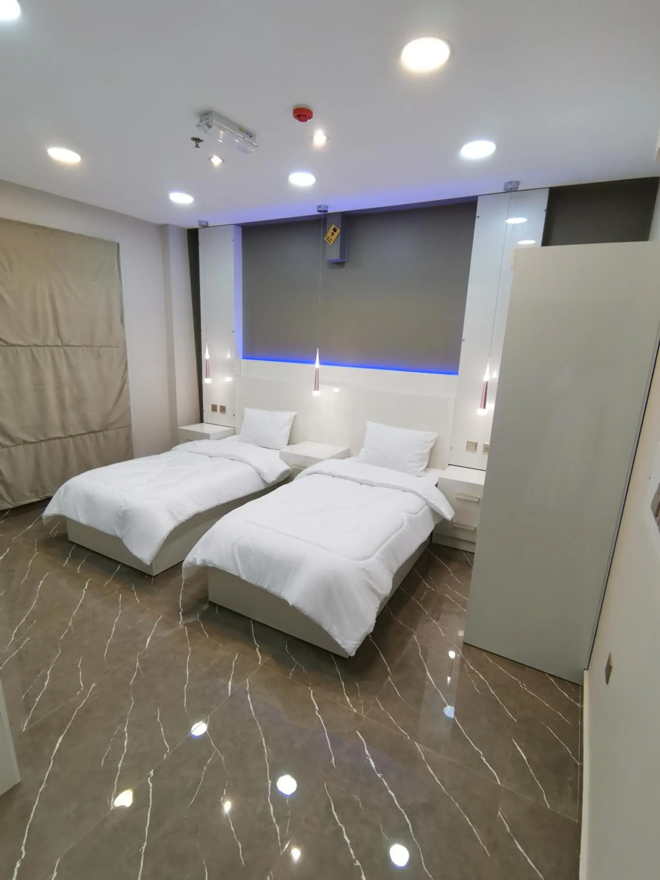 Twin Room with Shared Toilet in Marina H Twin Room with Shared Toilet in Marina H