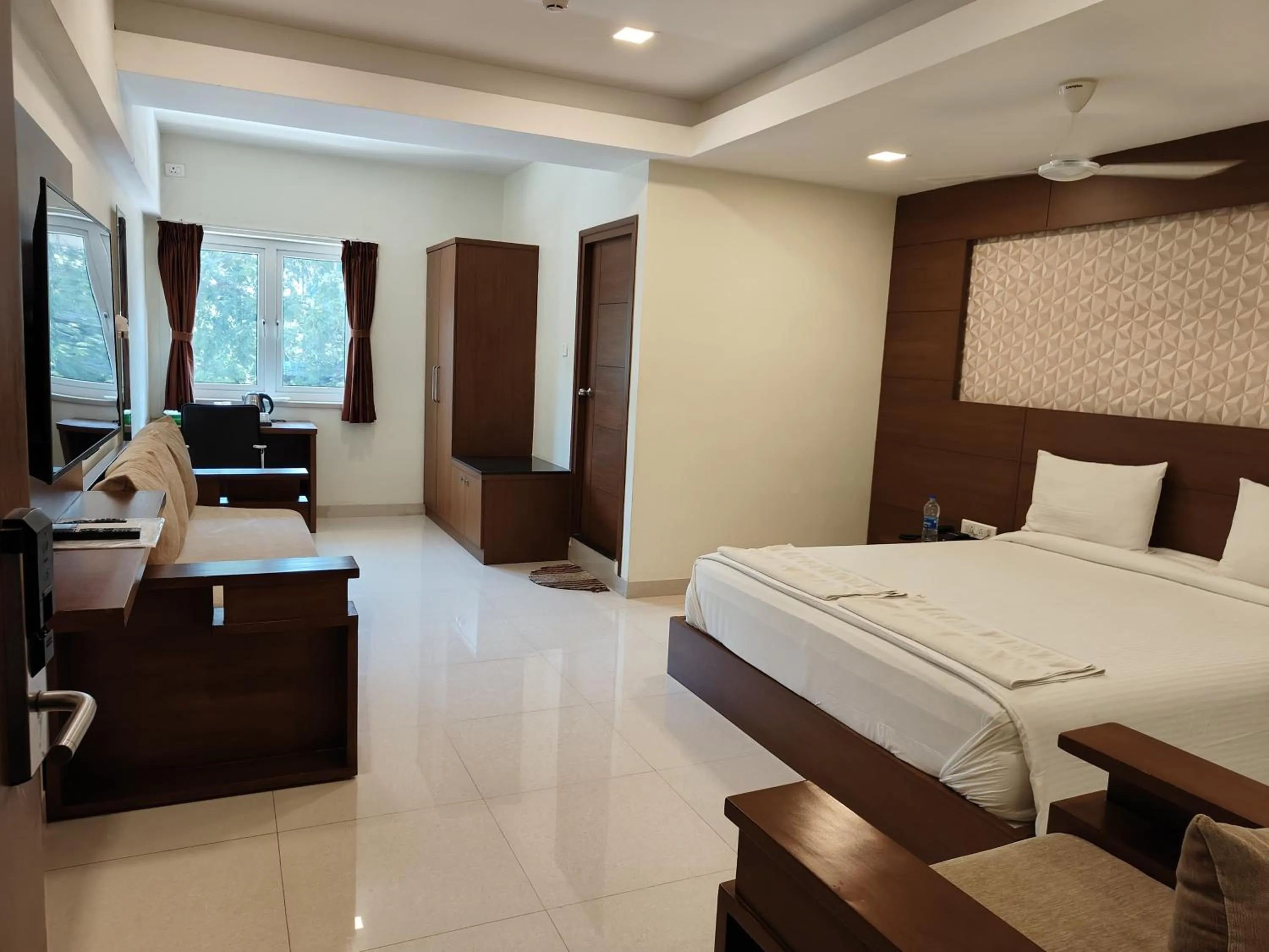 Photo of the whole room, Bed in A and M Rooms and Residences