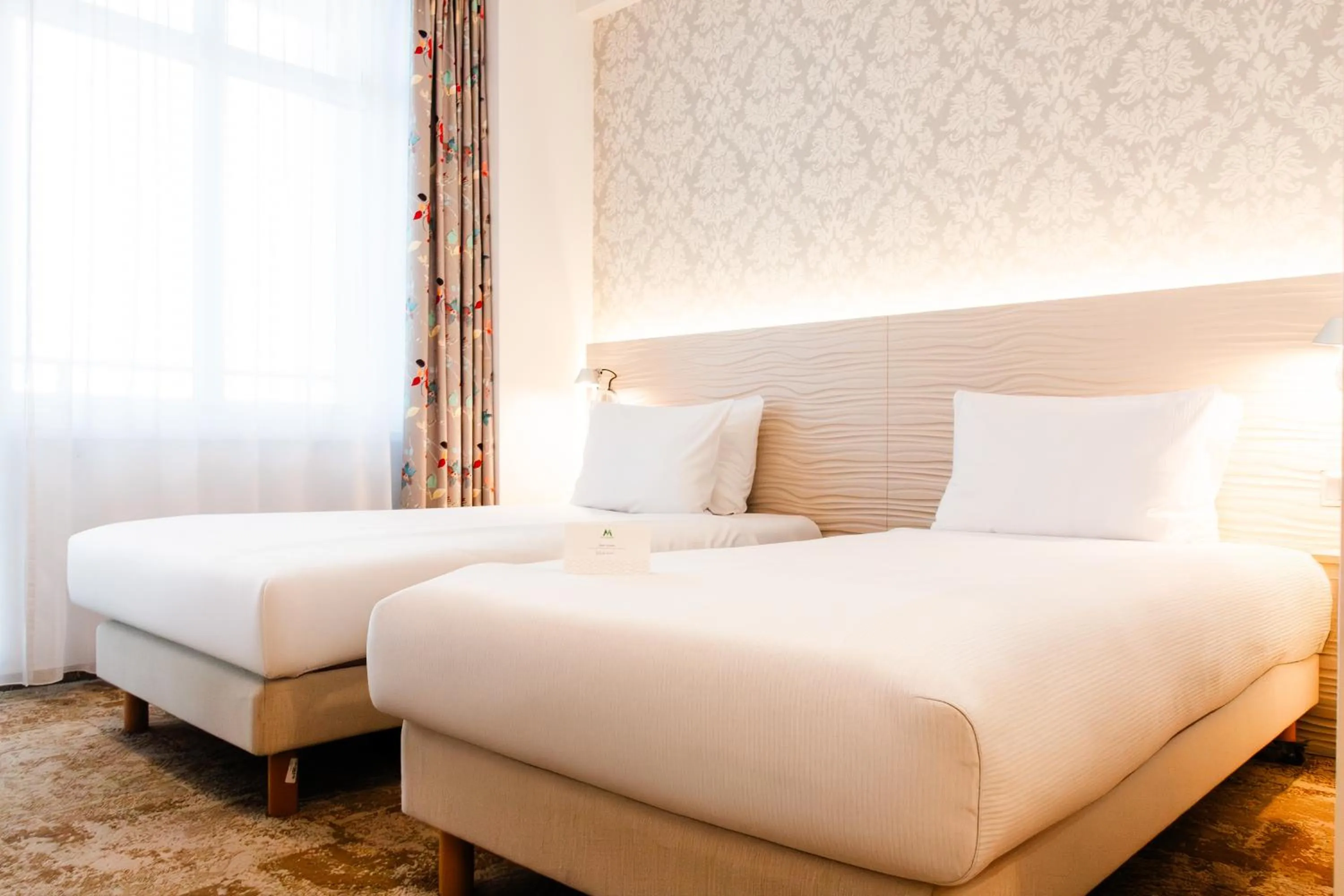 Bed in Hotel Metropol