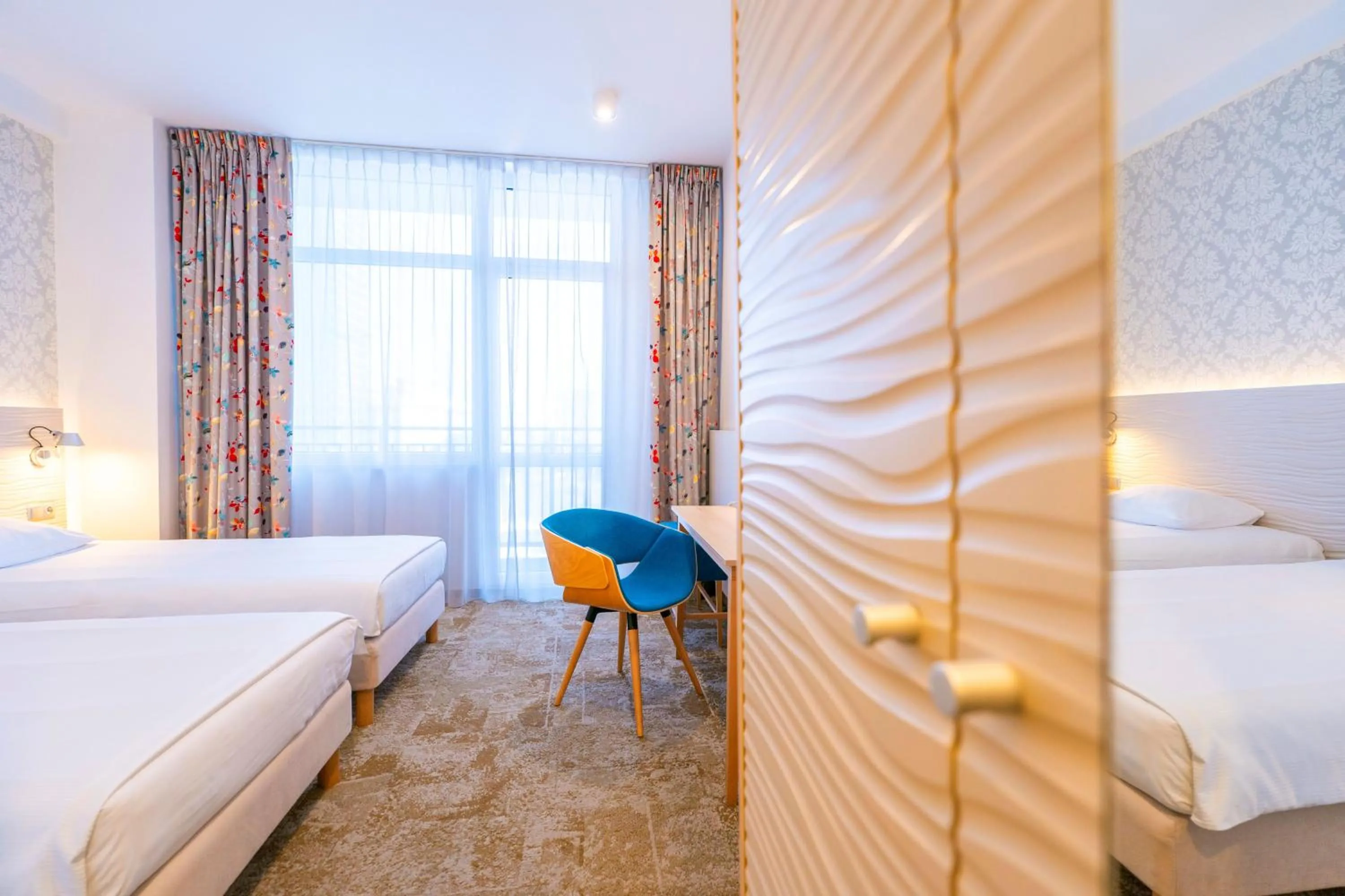 Bed in Hotel Metropol