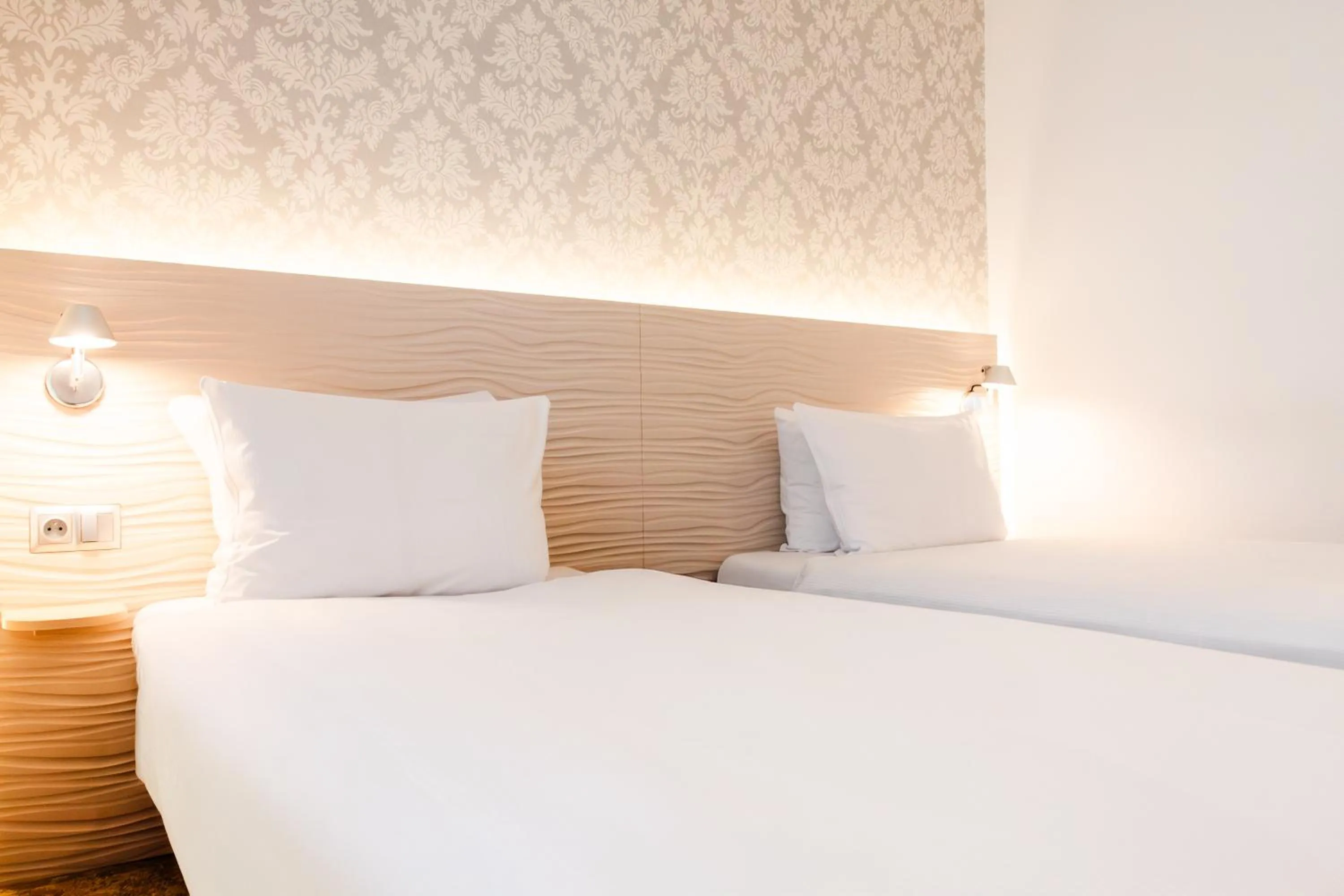 Bed in Hotel Metropol