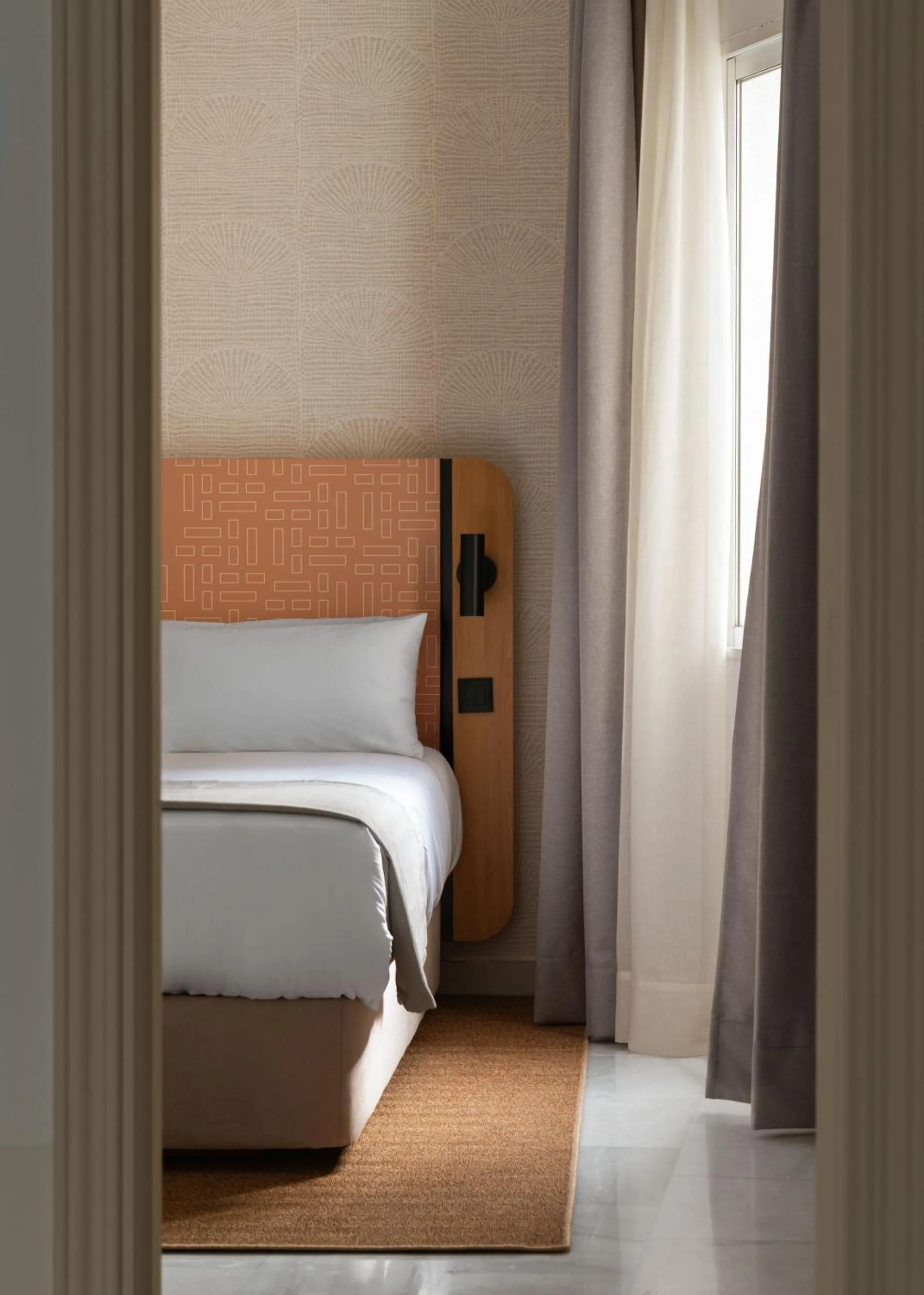 Bed in Limehome Madrid Sol