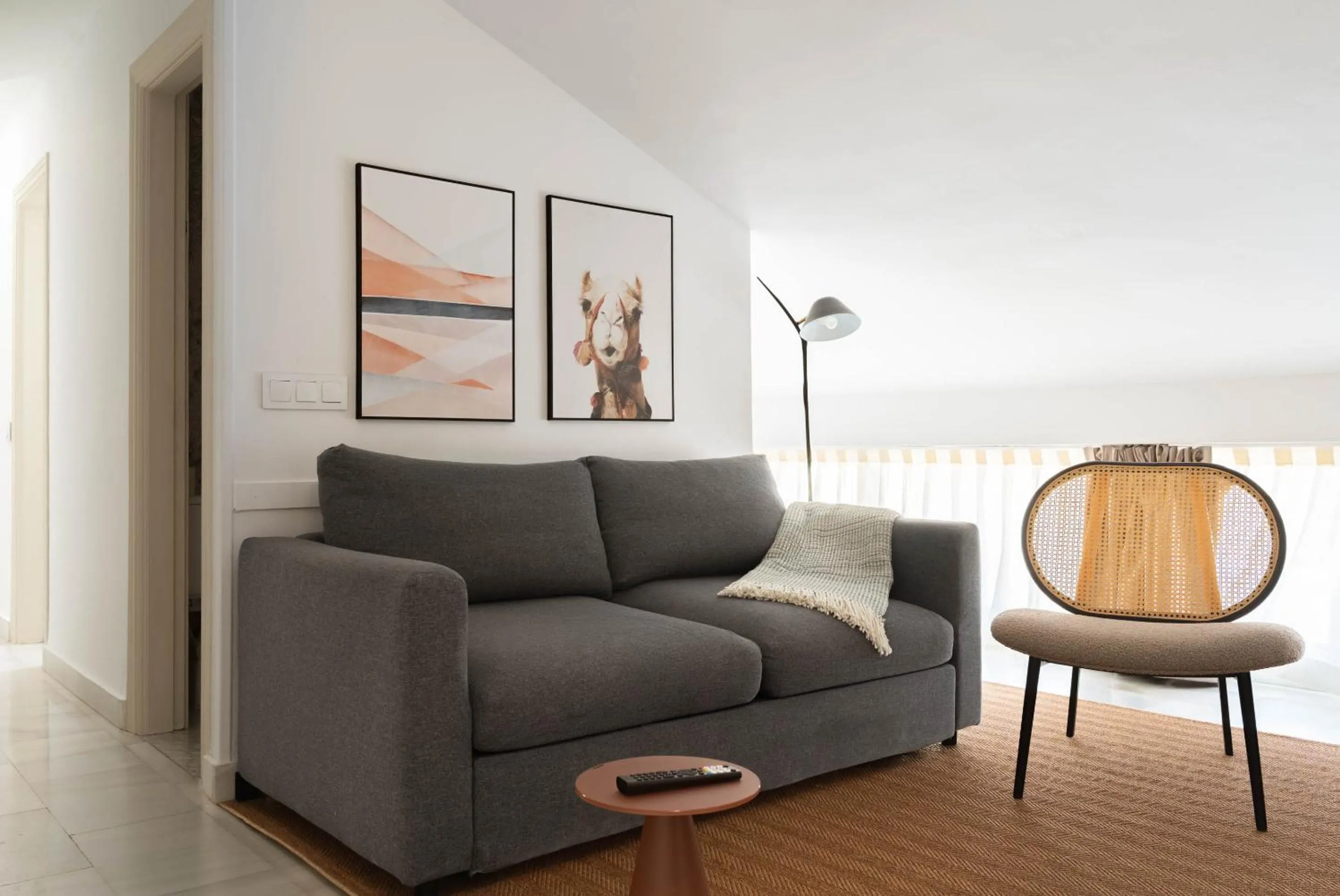 Living room in Limehome Madrid Sol