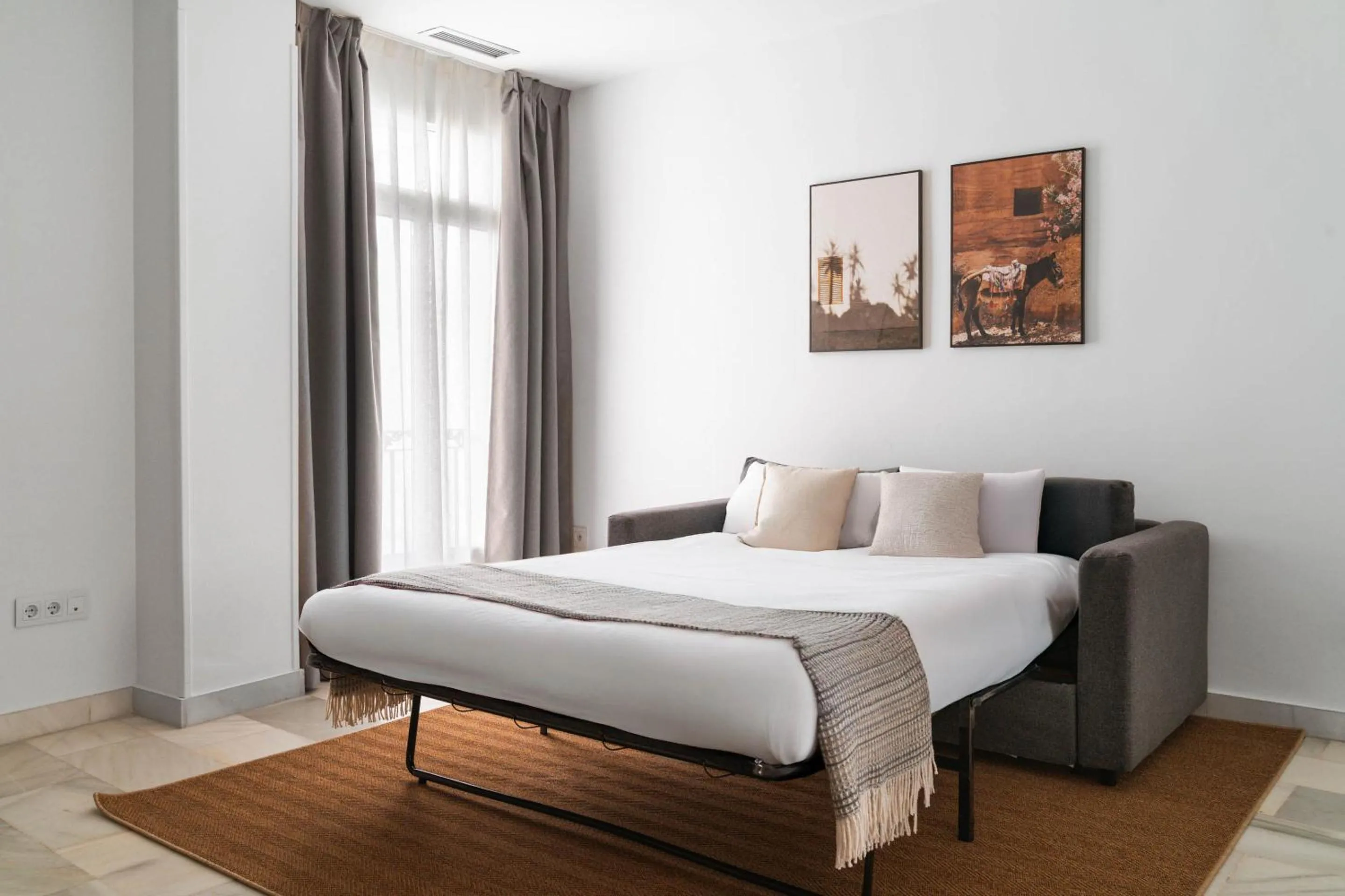 Bed in Limehome Madrid Sol
