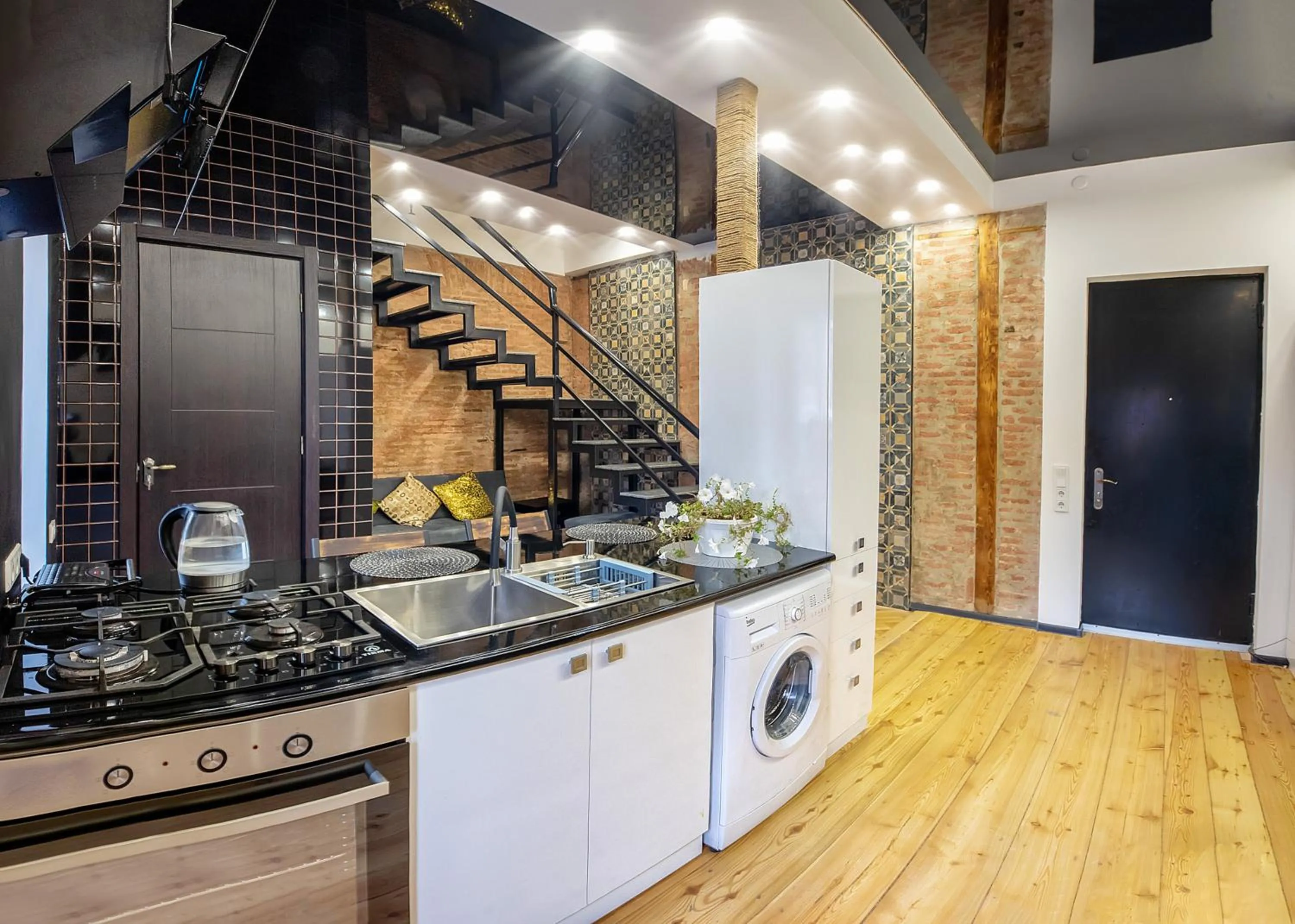 Kitchen or kitchenette in HB apartments Aghmashenebeli