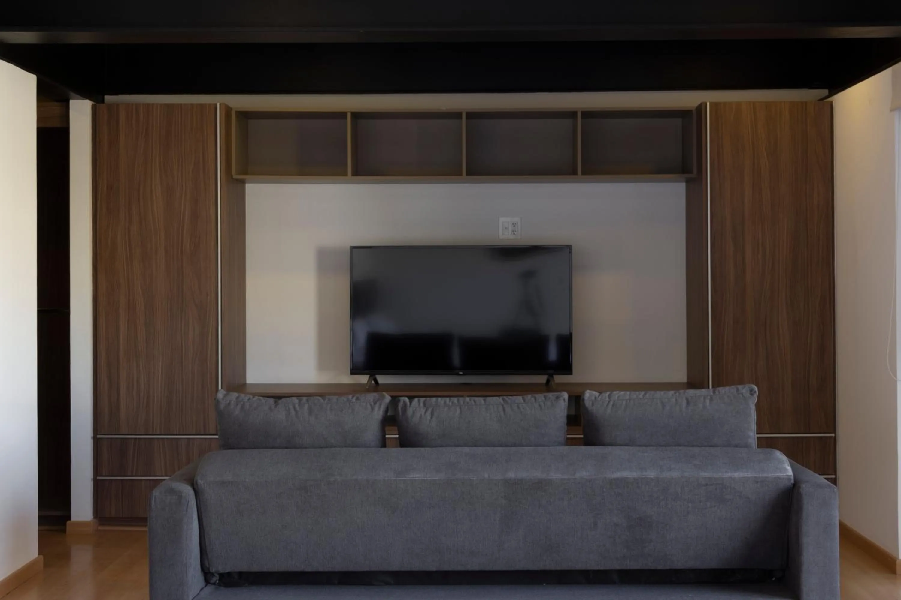 Living room in El Doce by HomiRent