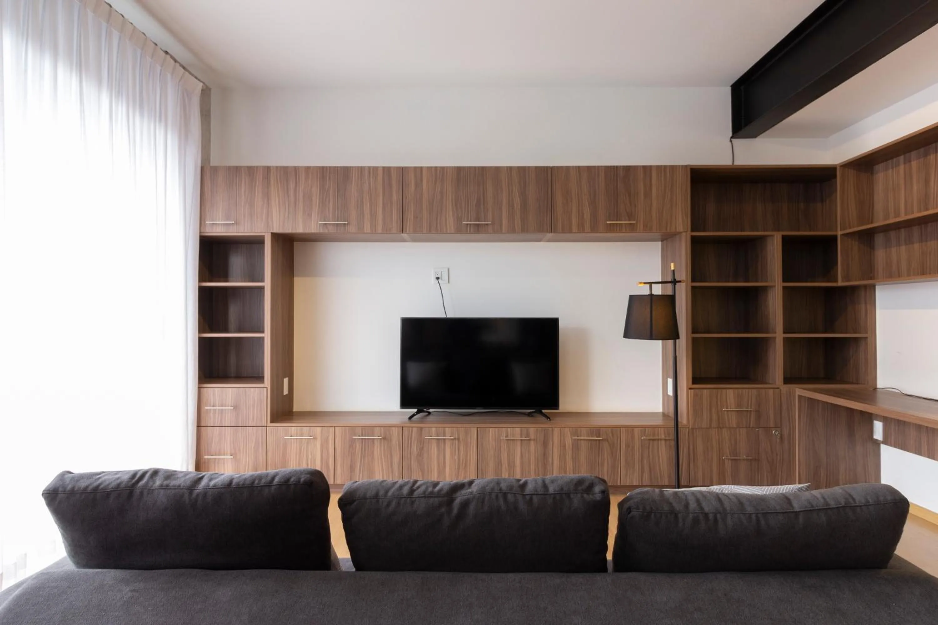 Living room in El Doce by HomiRent