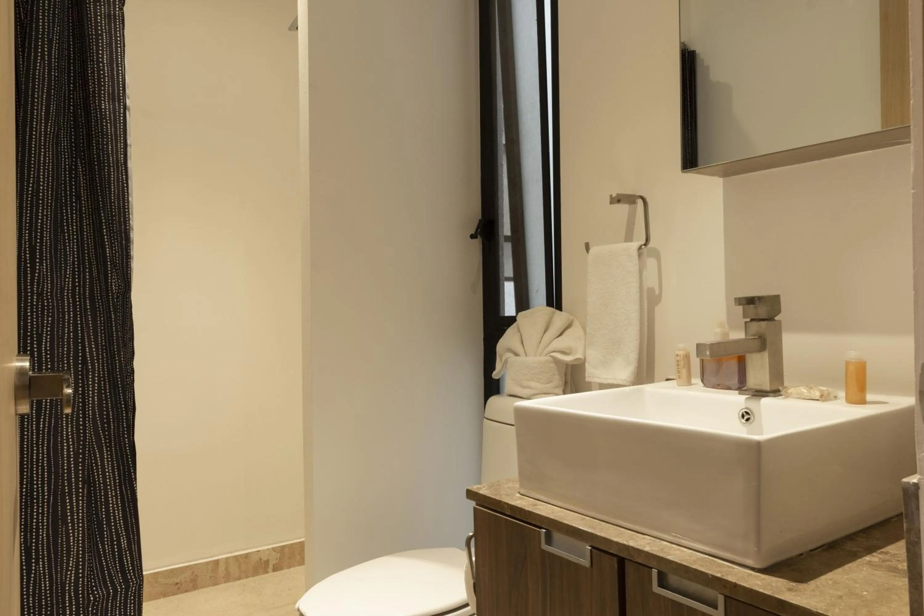 Bathroom in El Doce by HomiRent