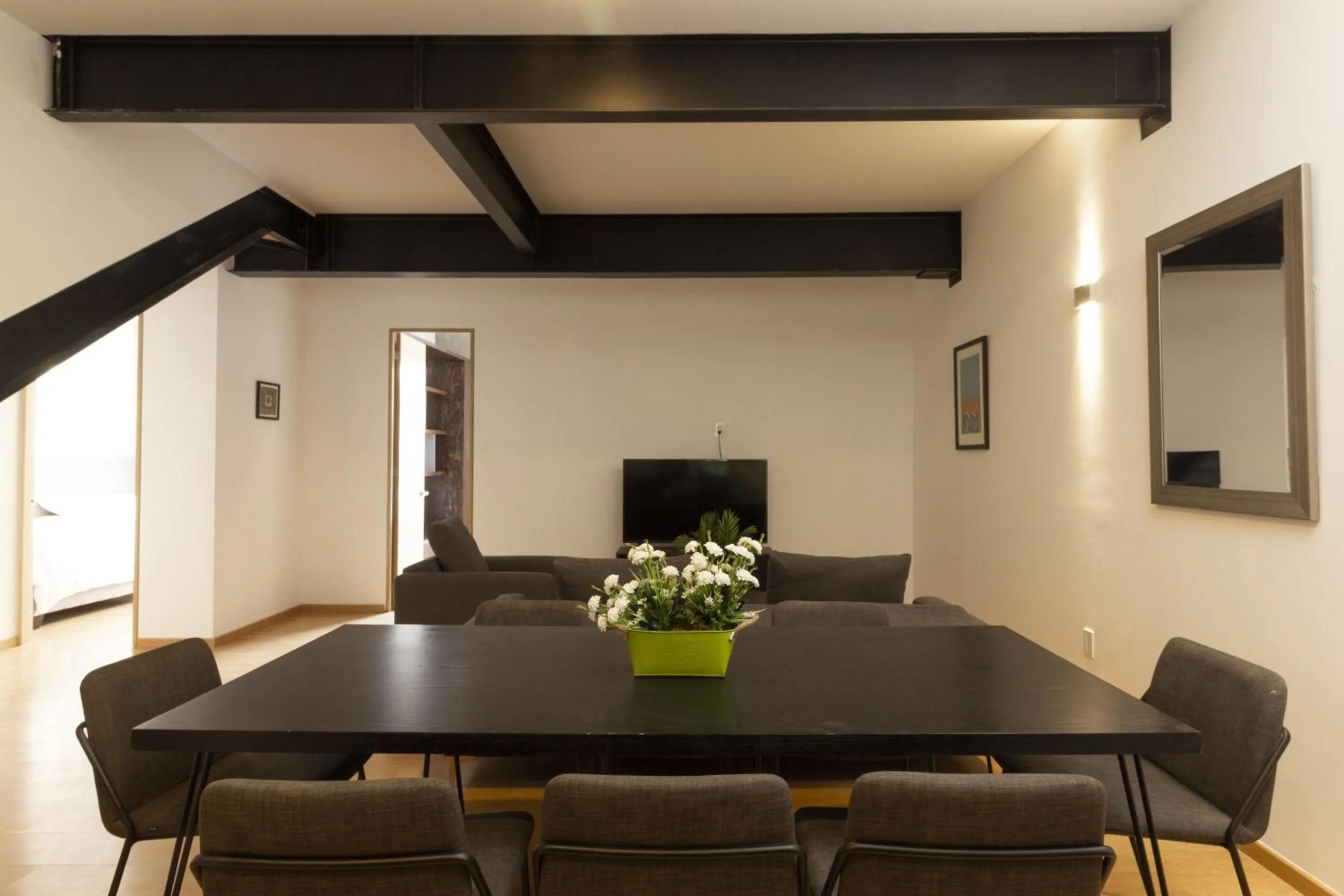 Dining area in El Doce by HomiRent