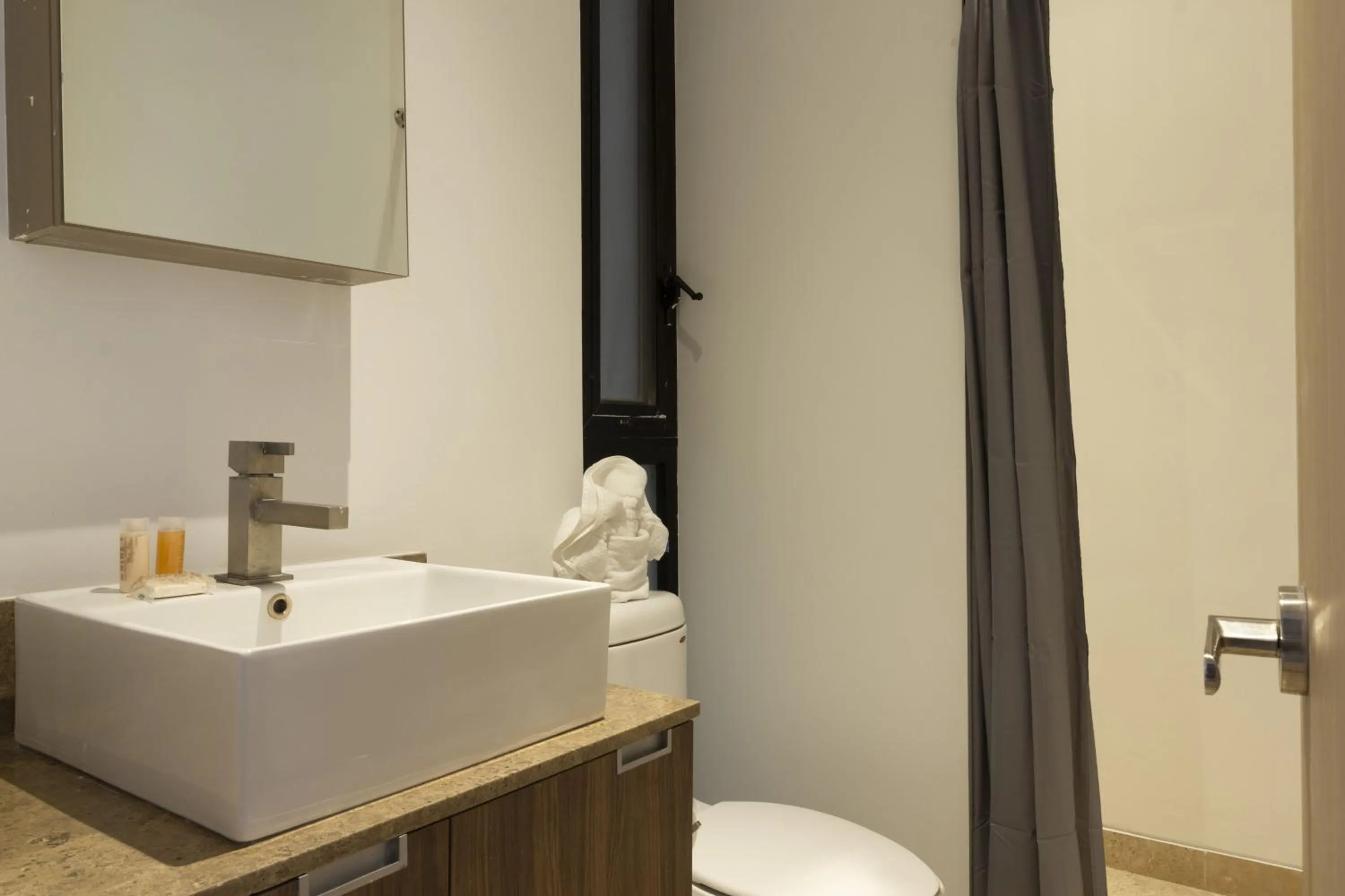 Bathroom in El Doce by HomiRent