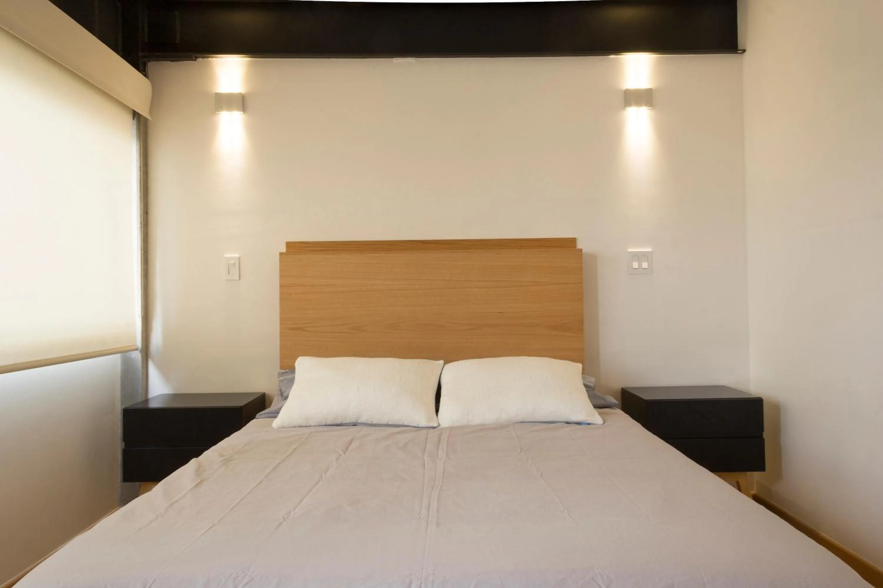 Bed in El Doce by HomiRent