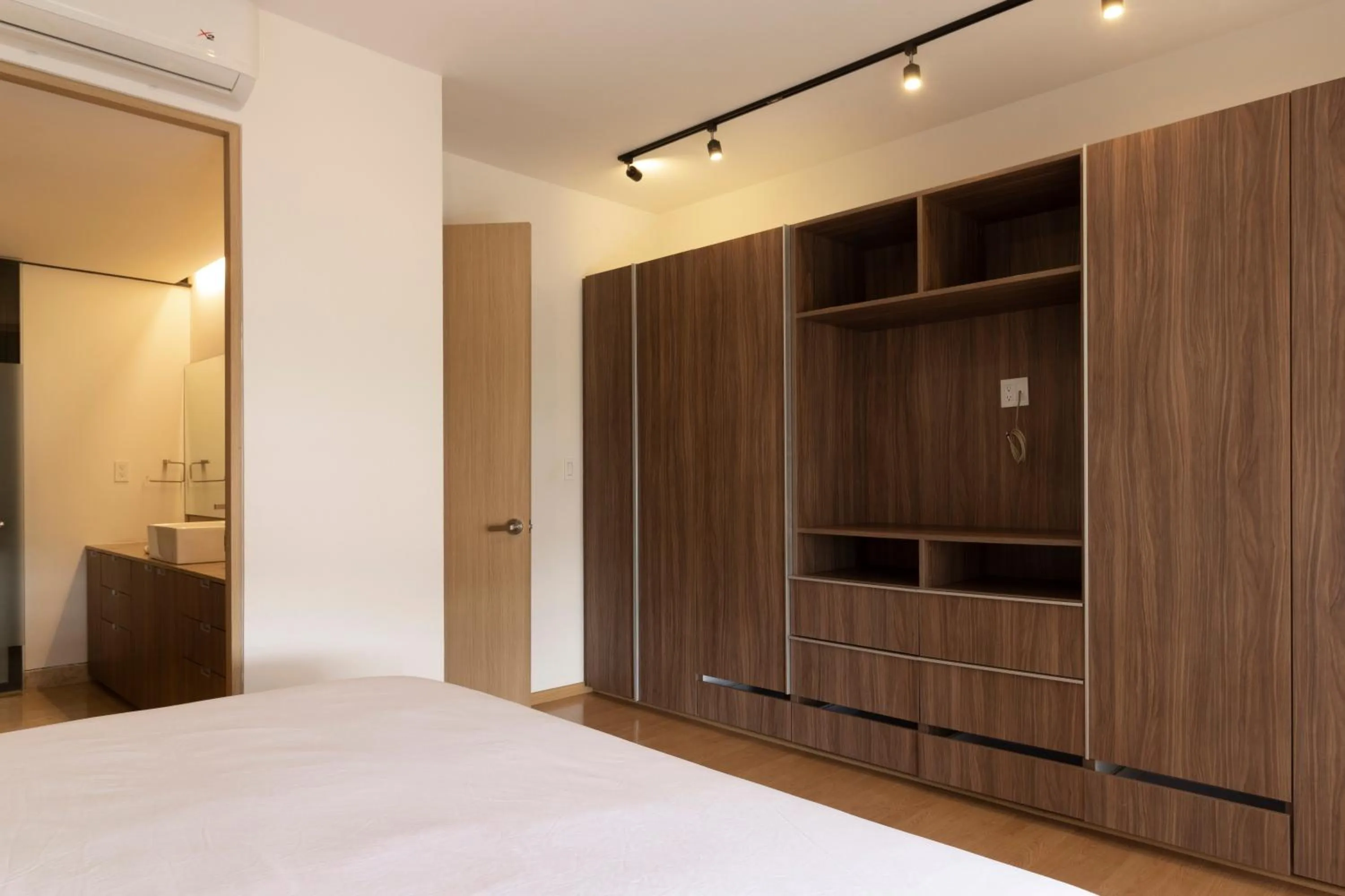 wardrobe, Bed in El Doce by HomiRent