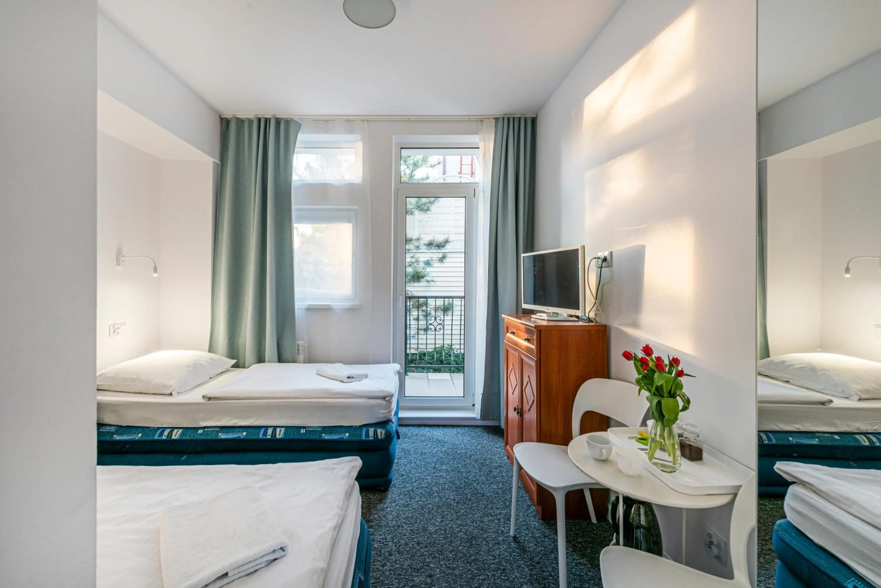 Communal lounge/ TV room, Bed in Willa Albatros Happy Hours