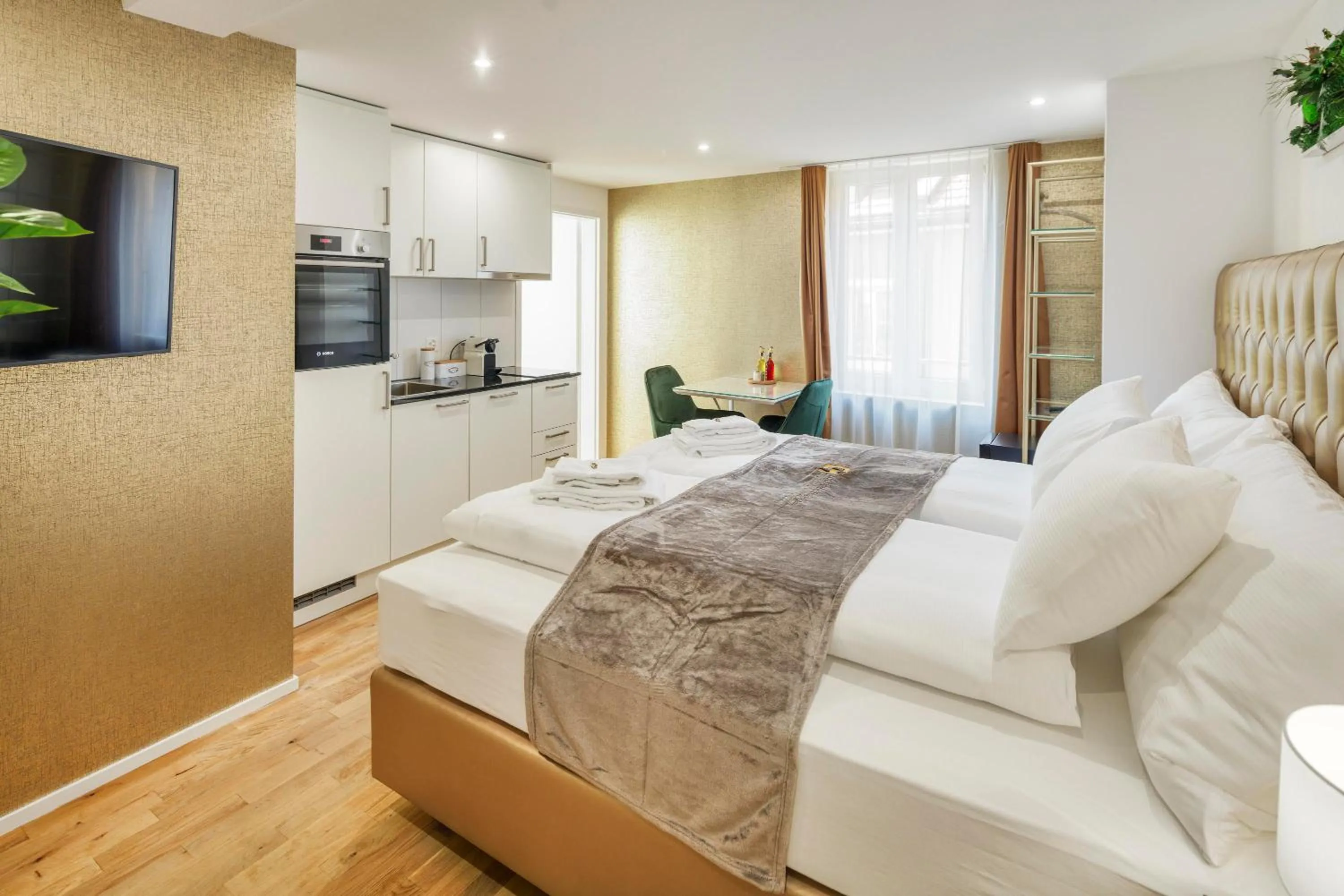 Photo of the whole room, Bed in VISIMO Apartments Steigerstrasse St Gallen - Modern Living near OLMA & Hospital