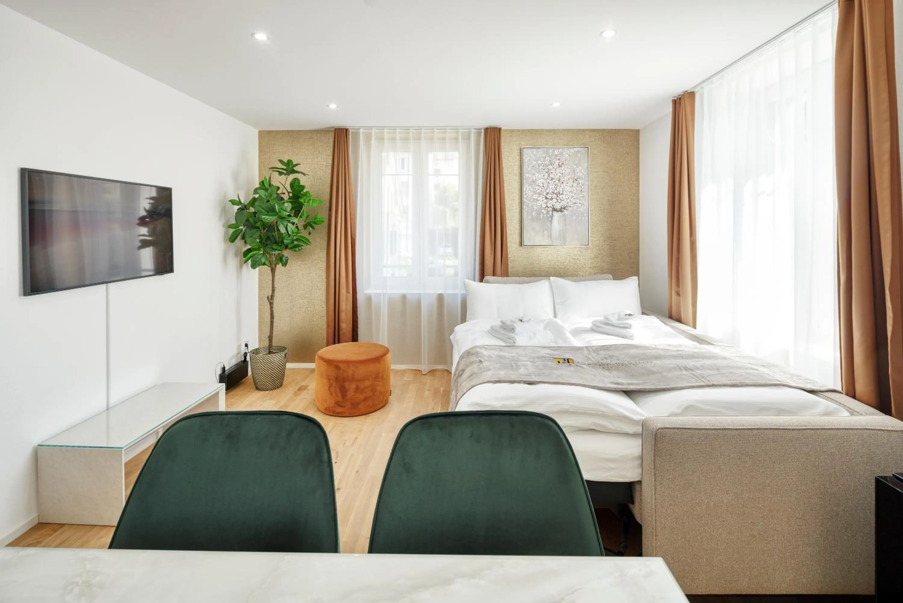 Living room, Bed in VISIMO Apartments Steigerstrasse St Gallen - Modern Living near OLMA & Hospital