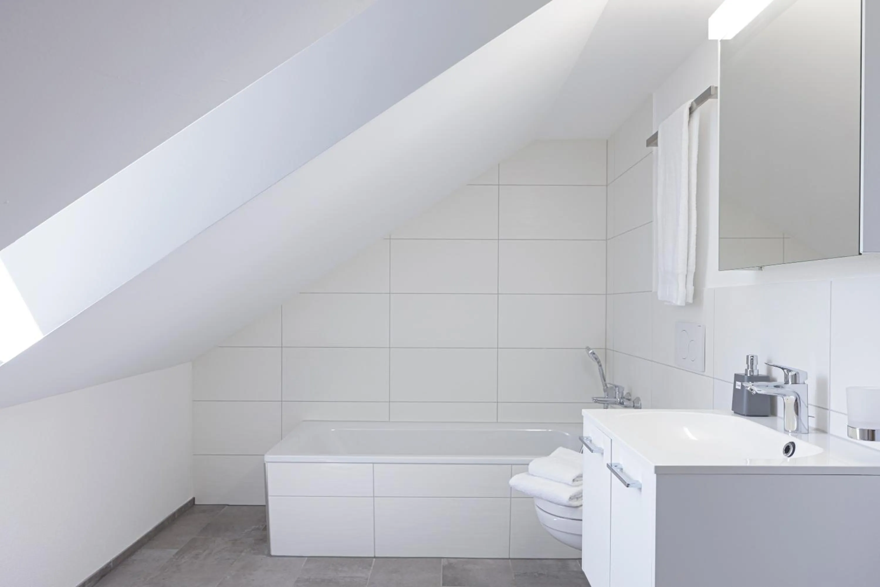 Bathroom in VISIMO Apartments Steigerstrasse St Gallen - Modern Living near OLMA & Hospital