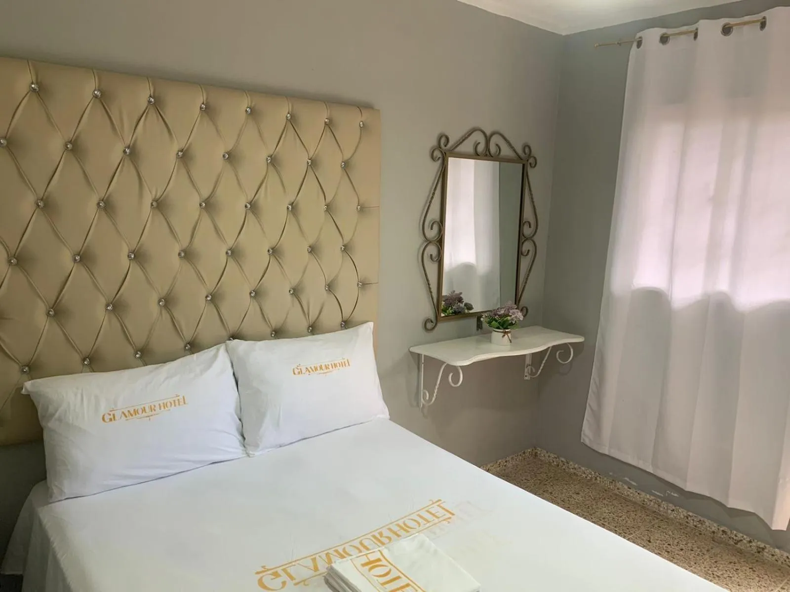 Bed in Glamour Hotel