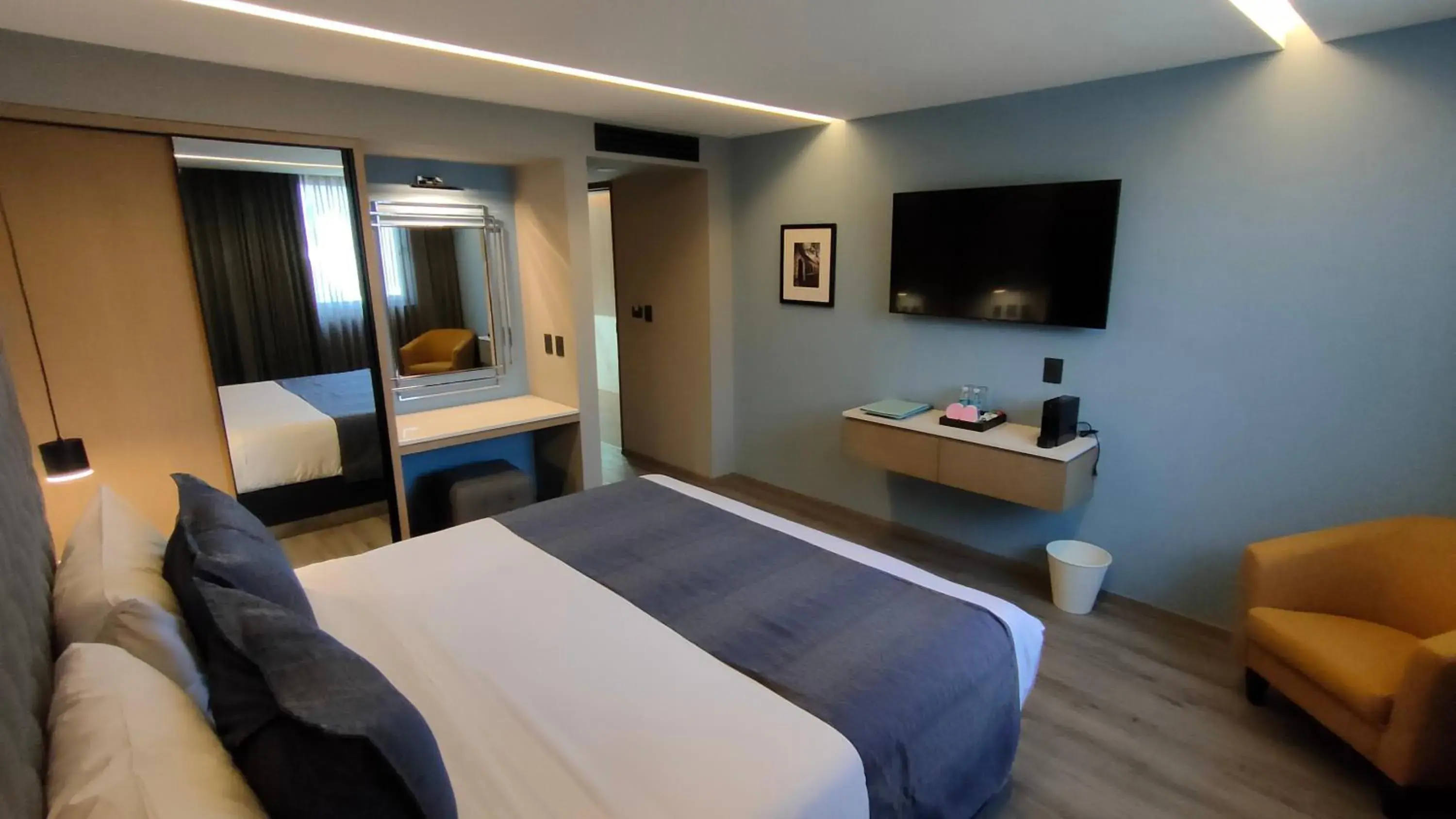 Communal lounge/ TV room, Bed in Alia Inn Boutique WTC Communal lounge/ TV room, Bed in Alia Inn Boutique WTC