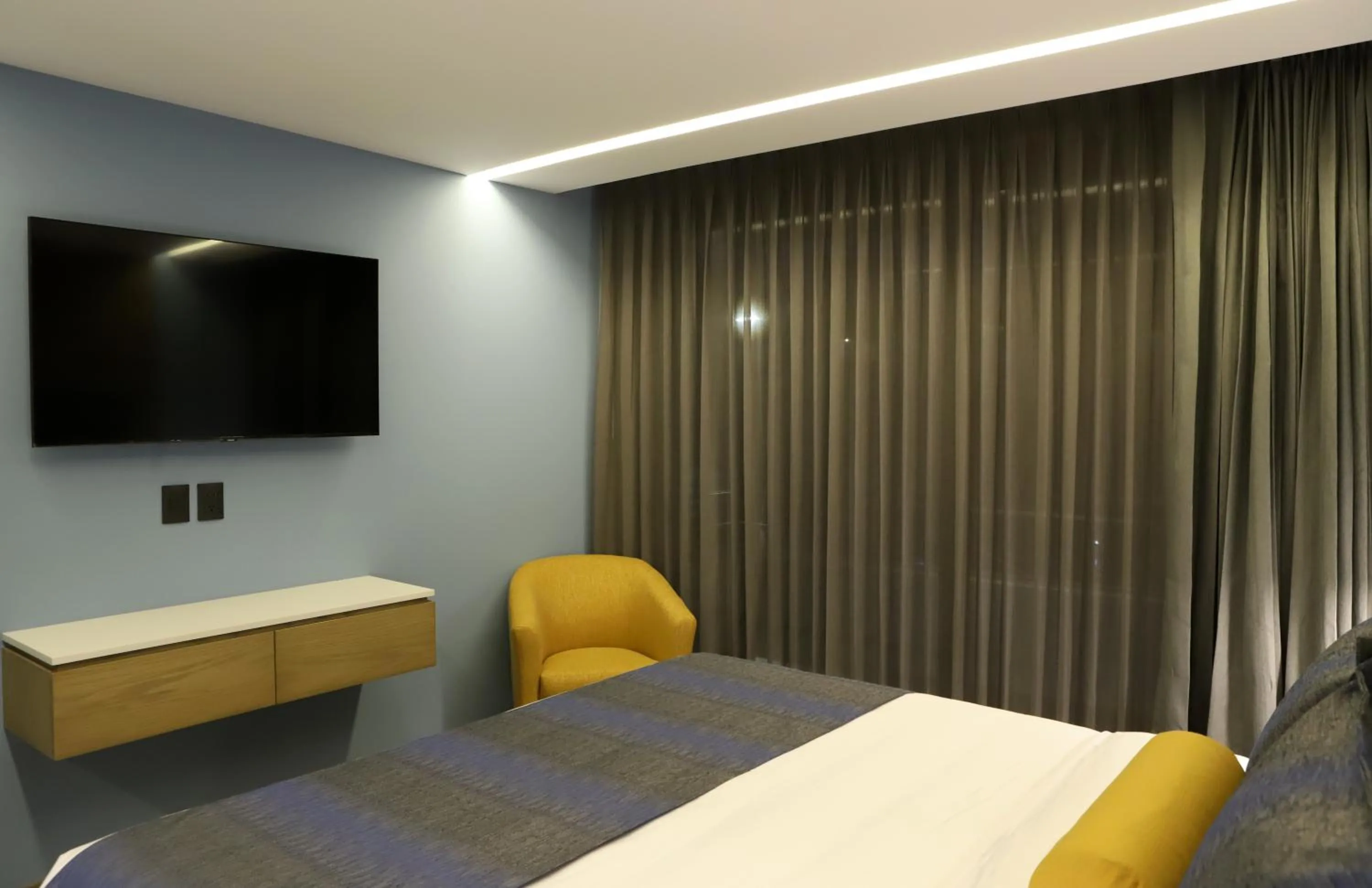 Communal lounge/ TV room, Bed in Alia Inn Boutique WTC