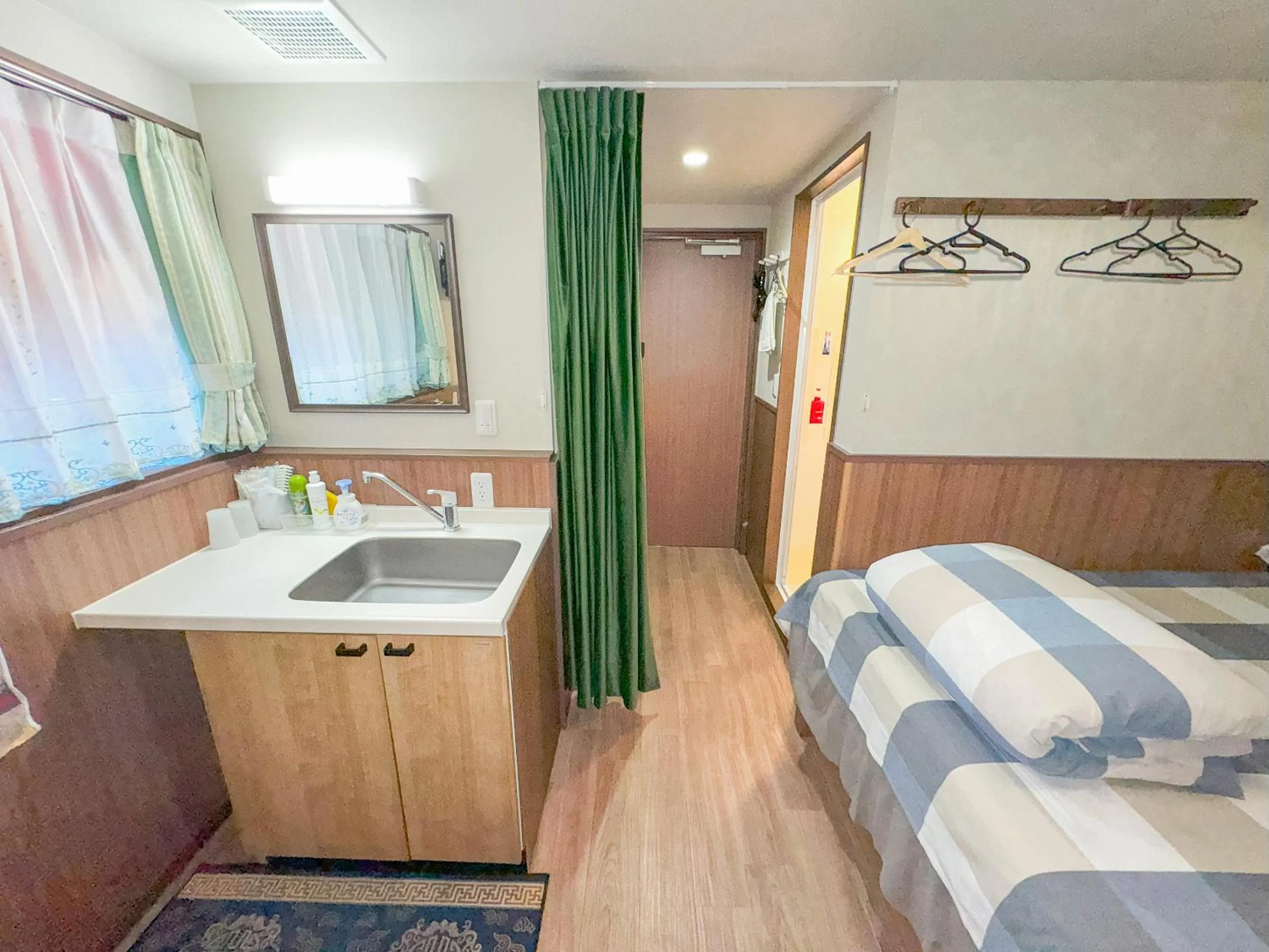 Bed in SHINJUKU WARM VILLA I