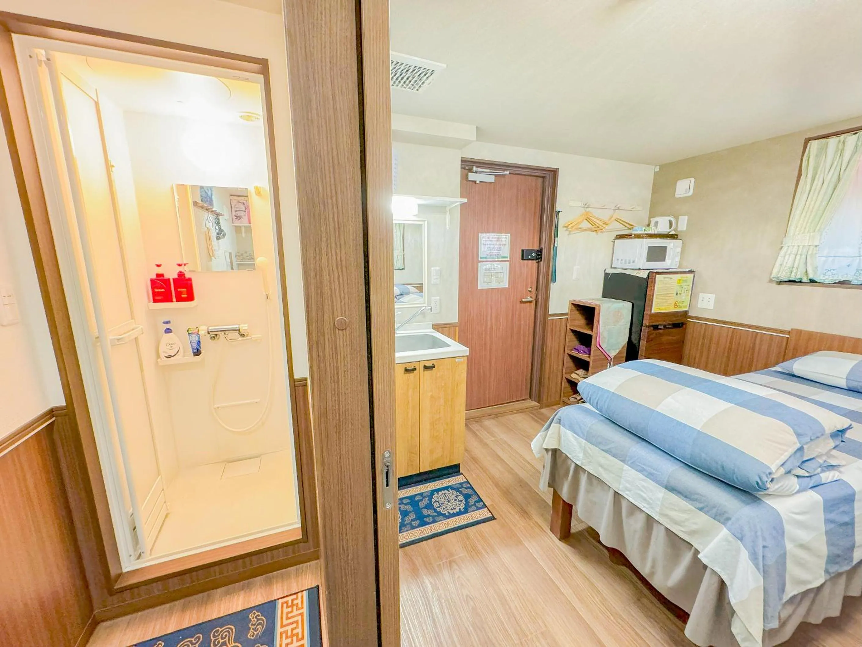 Bed in SHINJUKU WARM VILLA I