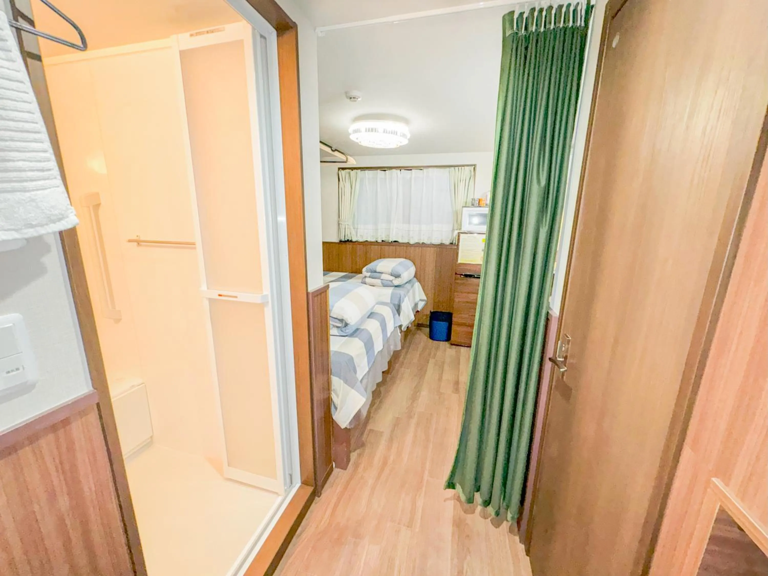 Bed in SHINJUKU WARM VILLA I