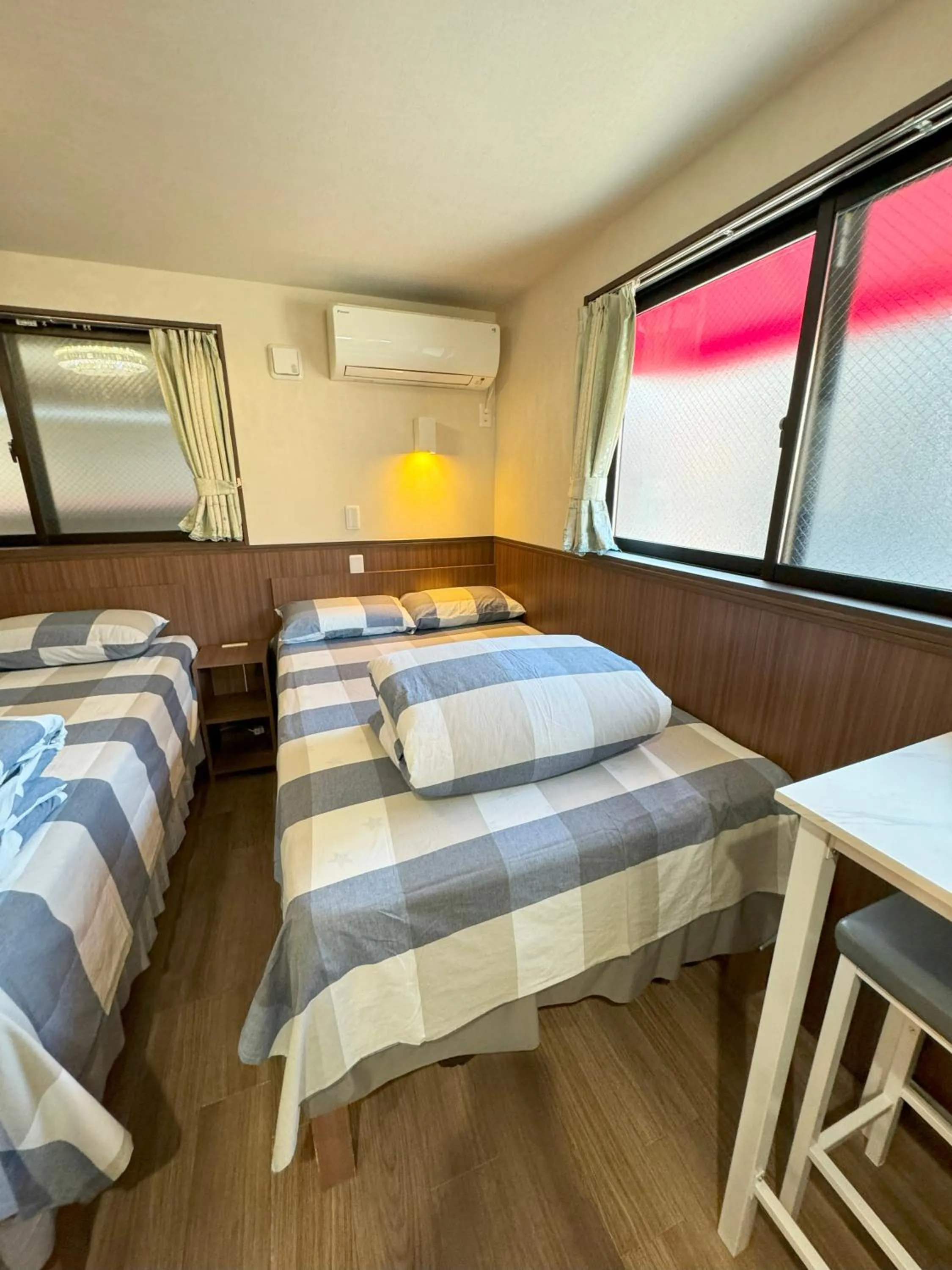 Bed in SHINJUKU WARM VILLA I