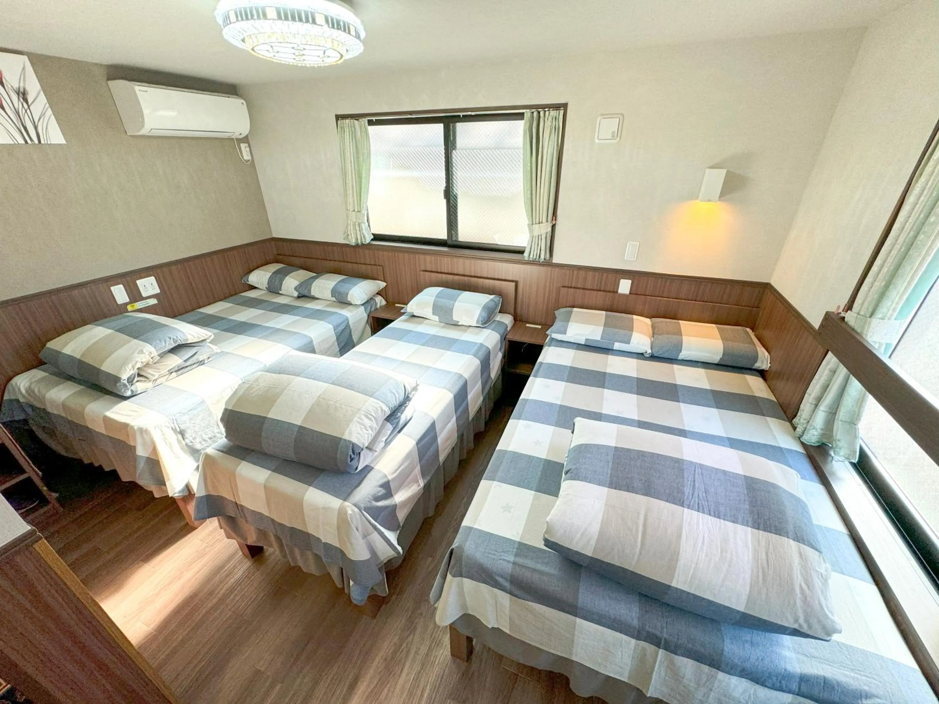 Bed in SHINJUKU WARM VILLA I